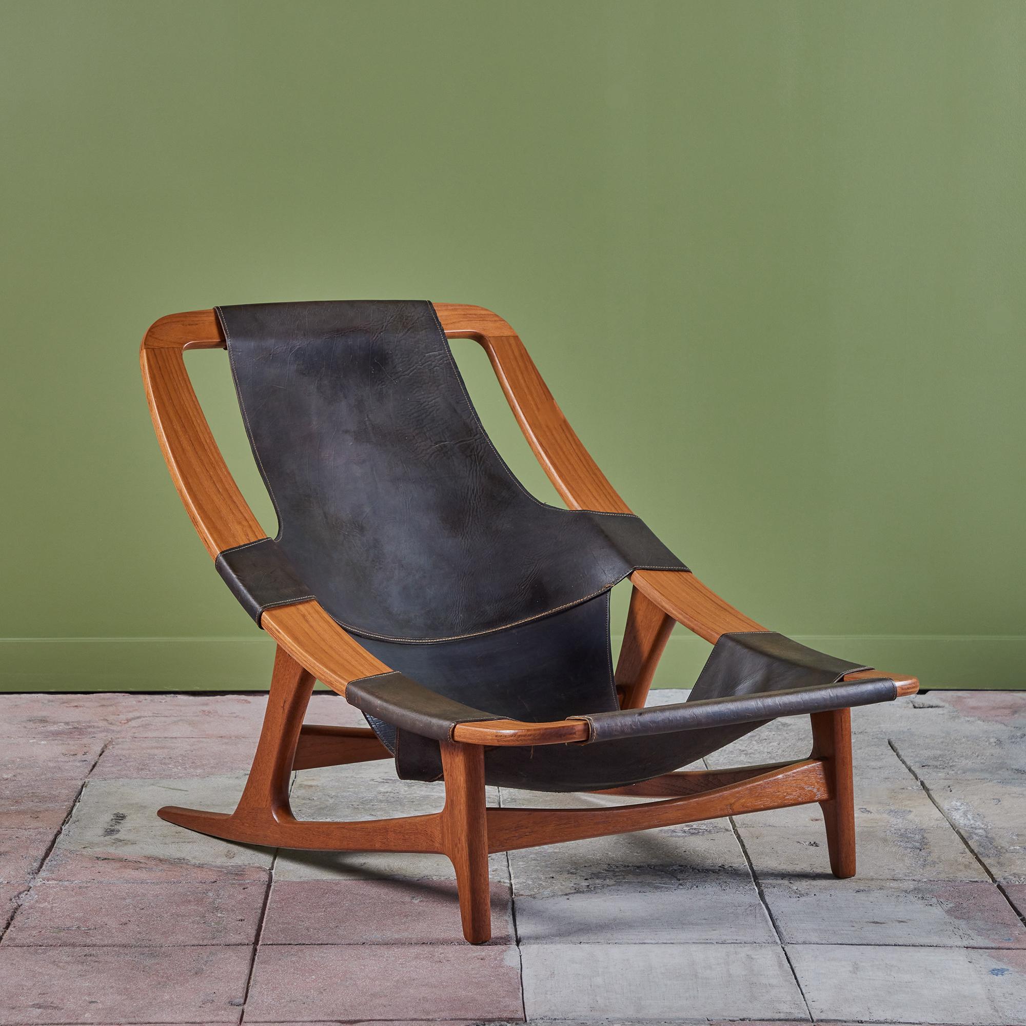 Designed in the 1950s by Arne Tidemand-Ruud for Norwegian company Norcraft. The solid teak frame is wrapped with a black leather sling seat. The lounge chair is adjustable to recline to a slightly more relaxed position.

Dimensions
27.25