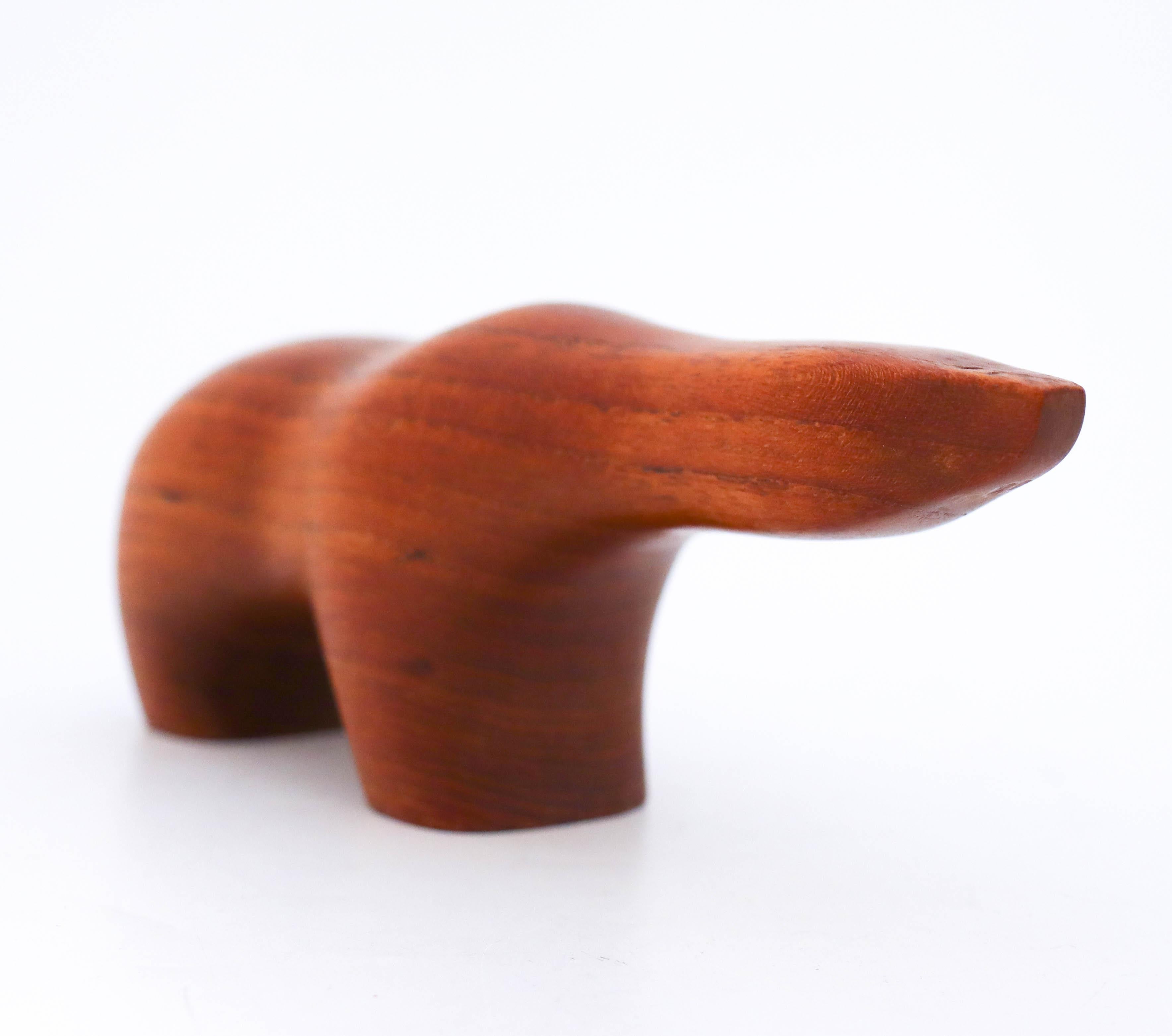 A bear in teak designed by Arne Tjomsland in Norway. The bear is 19.5 cm long and in very good condition except from a minor chip on the front of it legs.


  