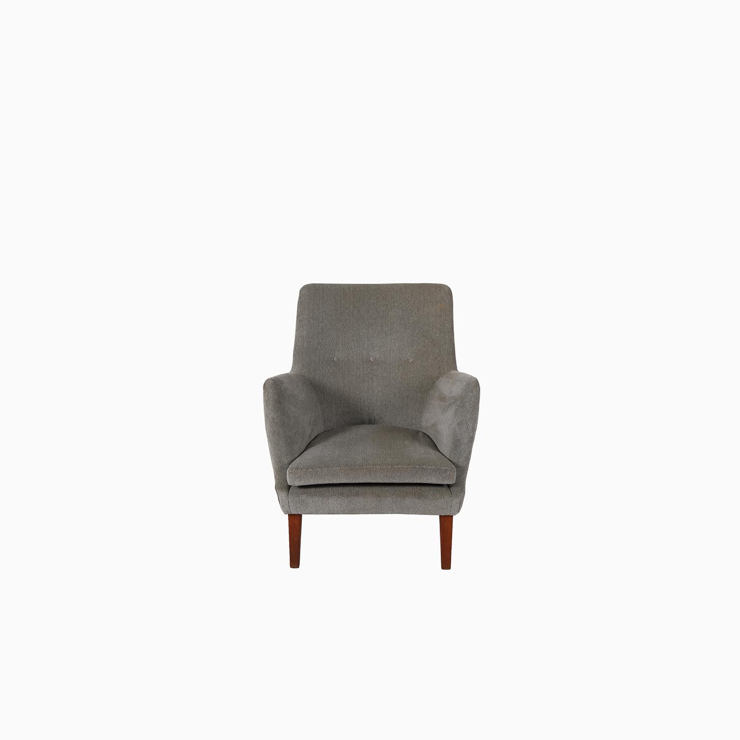A rare early production AV 53 lounge chair designed by Arne Vodder and produced by Ivan Schlechter. This design is a softer form and takes from the more tradition design vocabulary. A beautiful refinement. For sale with existing upholstery, or we