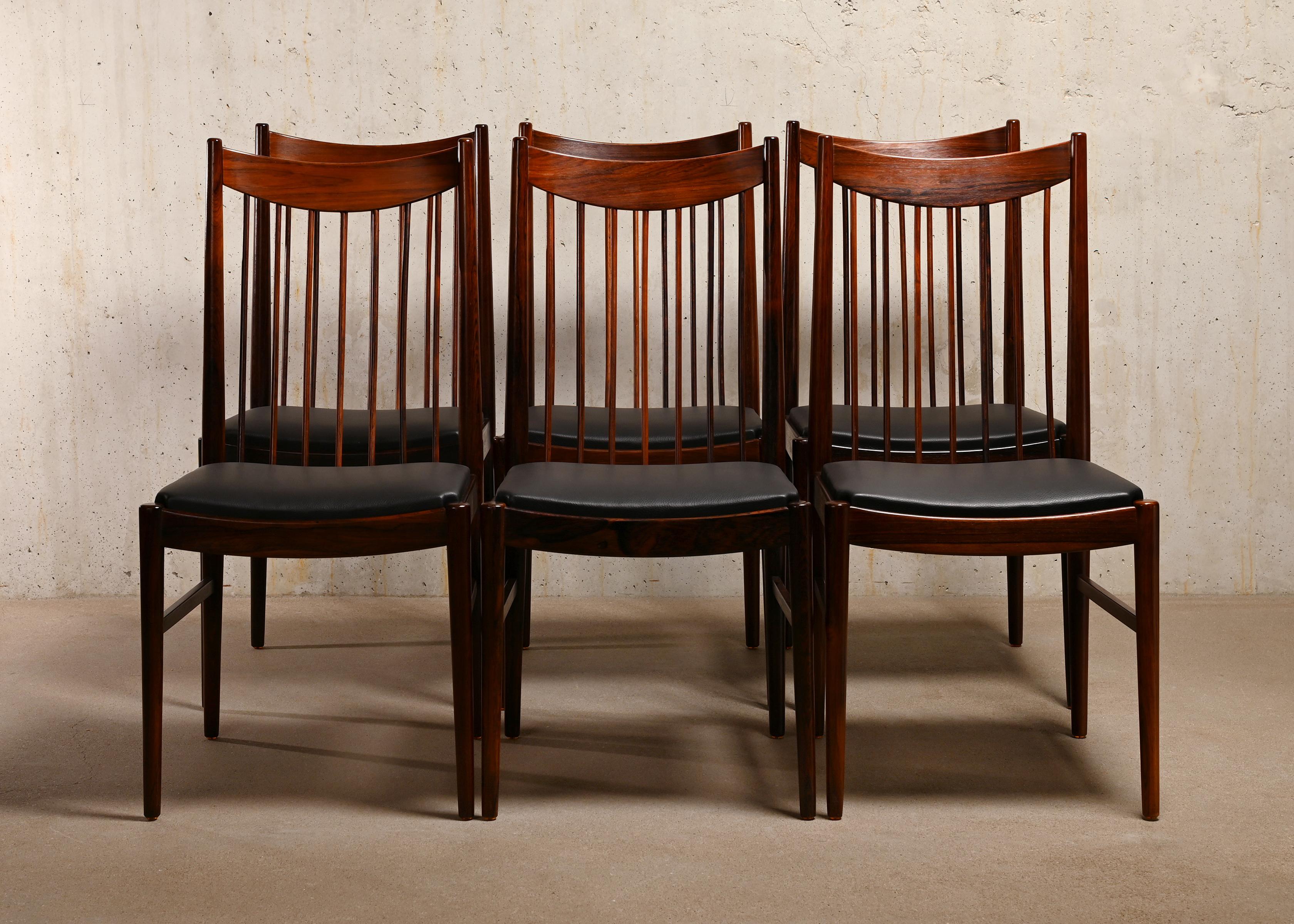 Elegant set of 6 dining chairs Model 422 designed by Arne Vodder for Sibast Furniture, Denmark. The design is sometimes also attributed to Helge Sibast. Solid Brazilian Rosewood frames in very good original condition with only slight wear and aging.