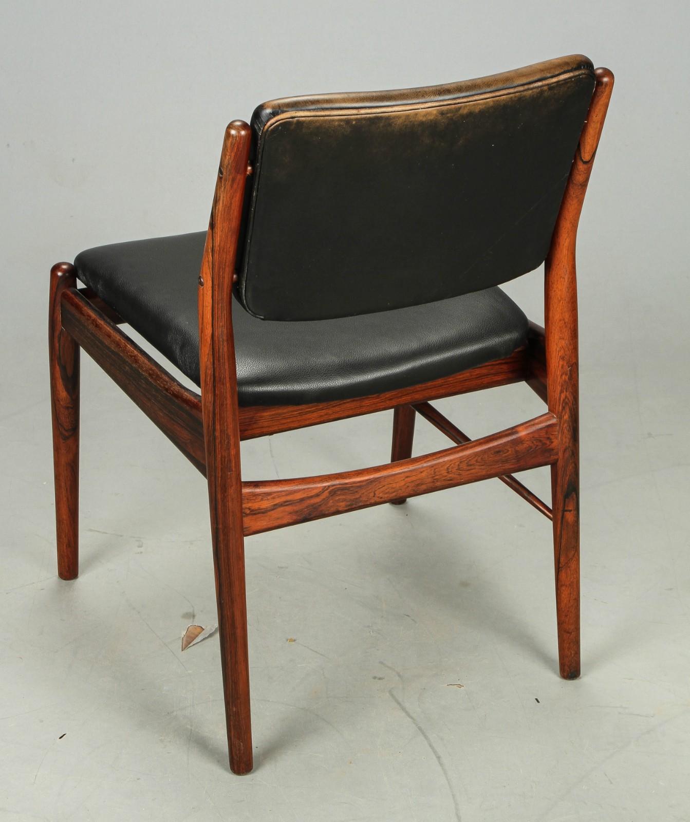 Hardwood frame upholstered with brack leather. Designed by Arne Vodder for Helge Sibast Møbler in the 1960s. Original condition not restored.