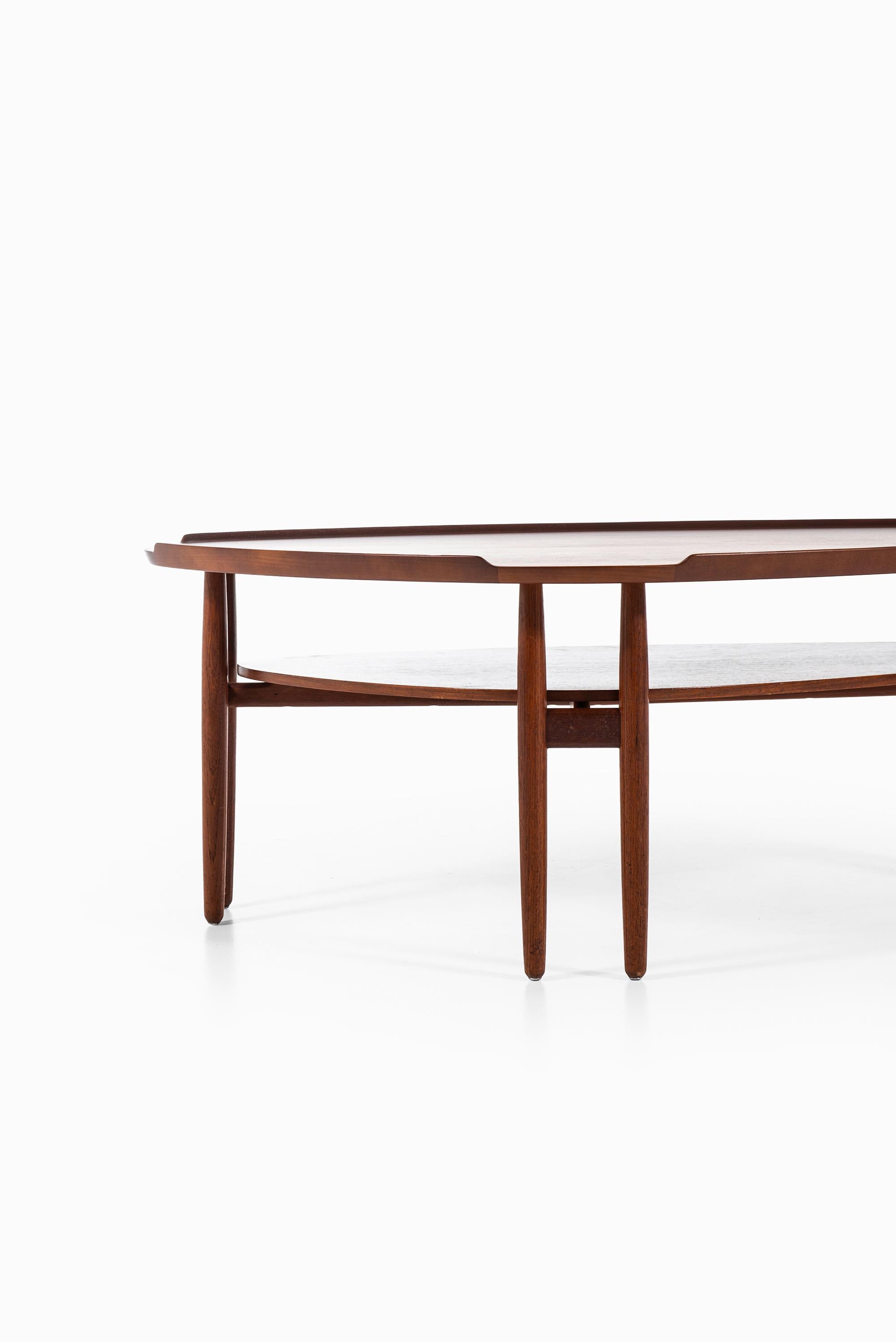 Rare coffee table designed by Arne Vodder. Produced in Denmark.