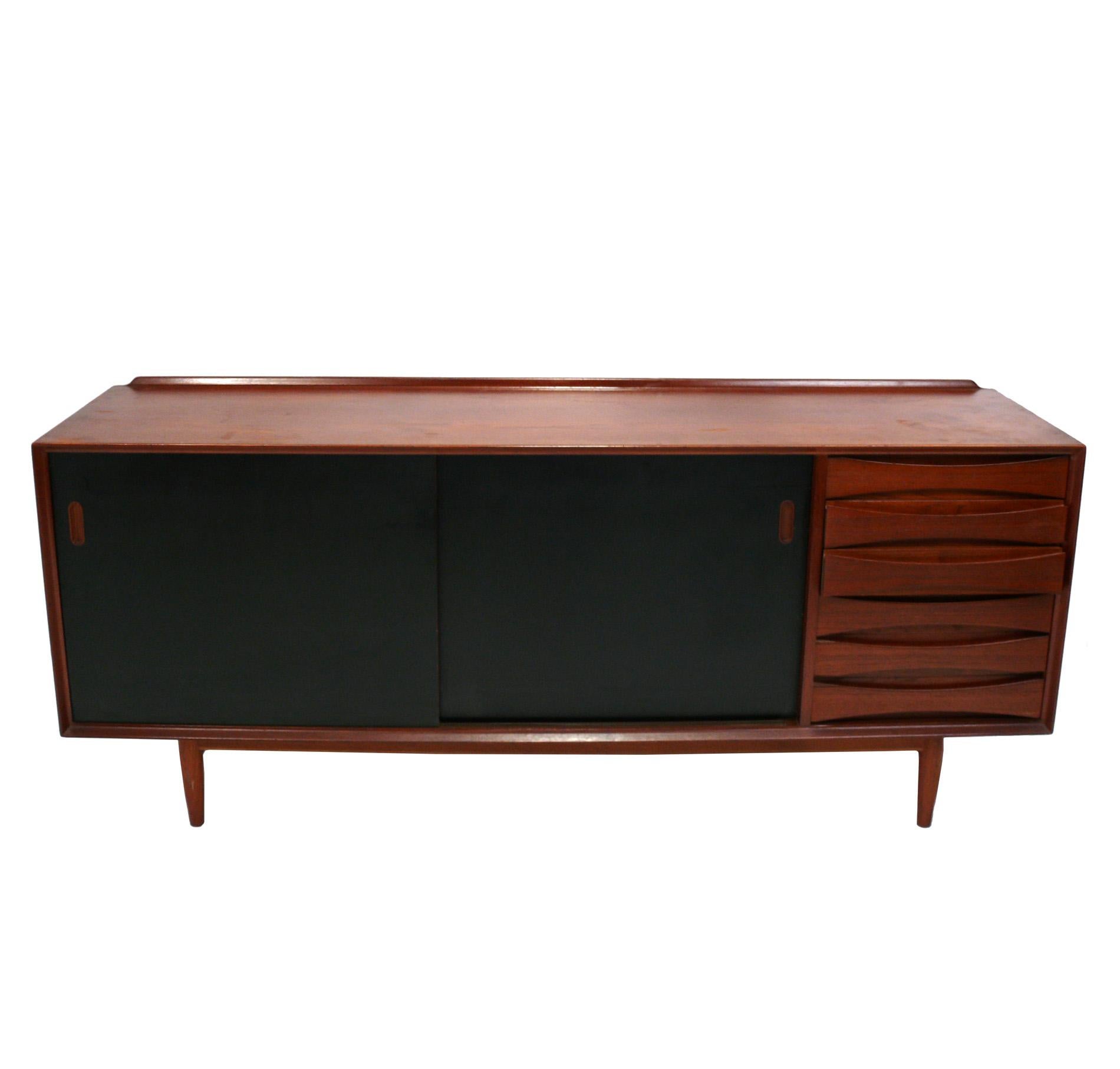 Clean Lined Danish Modern Credenza, designed by Arne Vodder for Sibast, Denmark, circa 1960s. This piece is currently being refinished and will look incredible when completed. The price noted includes refinishing in your choice of color. This piece