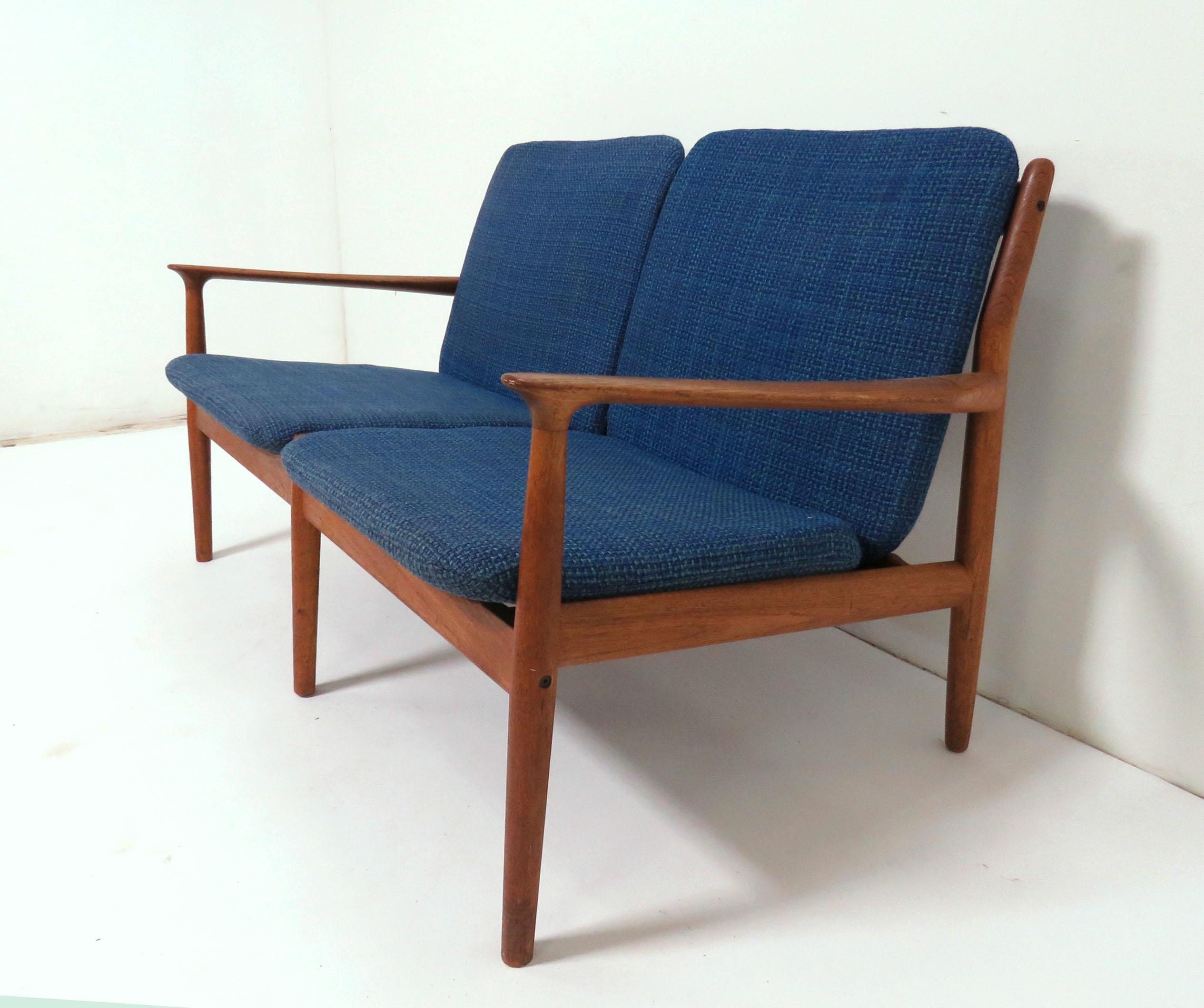 Teak loveseat / two-seat sofa by Arne Vodder for Glostrup, circa 1960s.