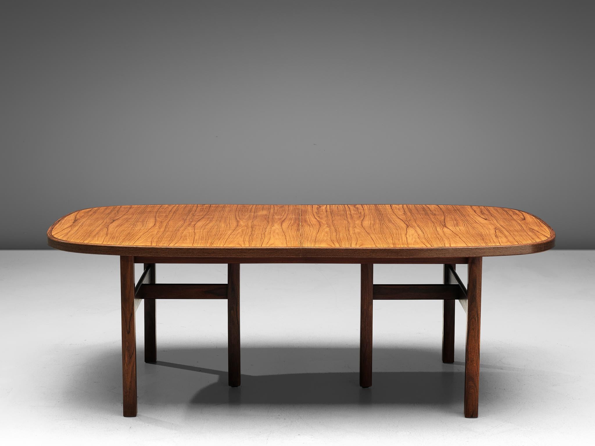 Arne Vodder for Sibast Møbler, dining table, rosewood, Denmark, 1950s.

Well-designed rosewood dining table with a squared oval top. This table has characteristic legs typical for Vodder's design. Both side show three legs in a triangle shape