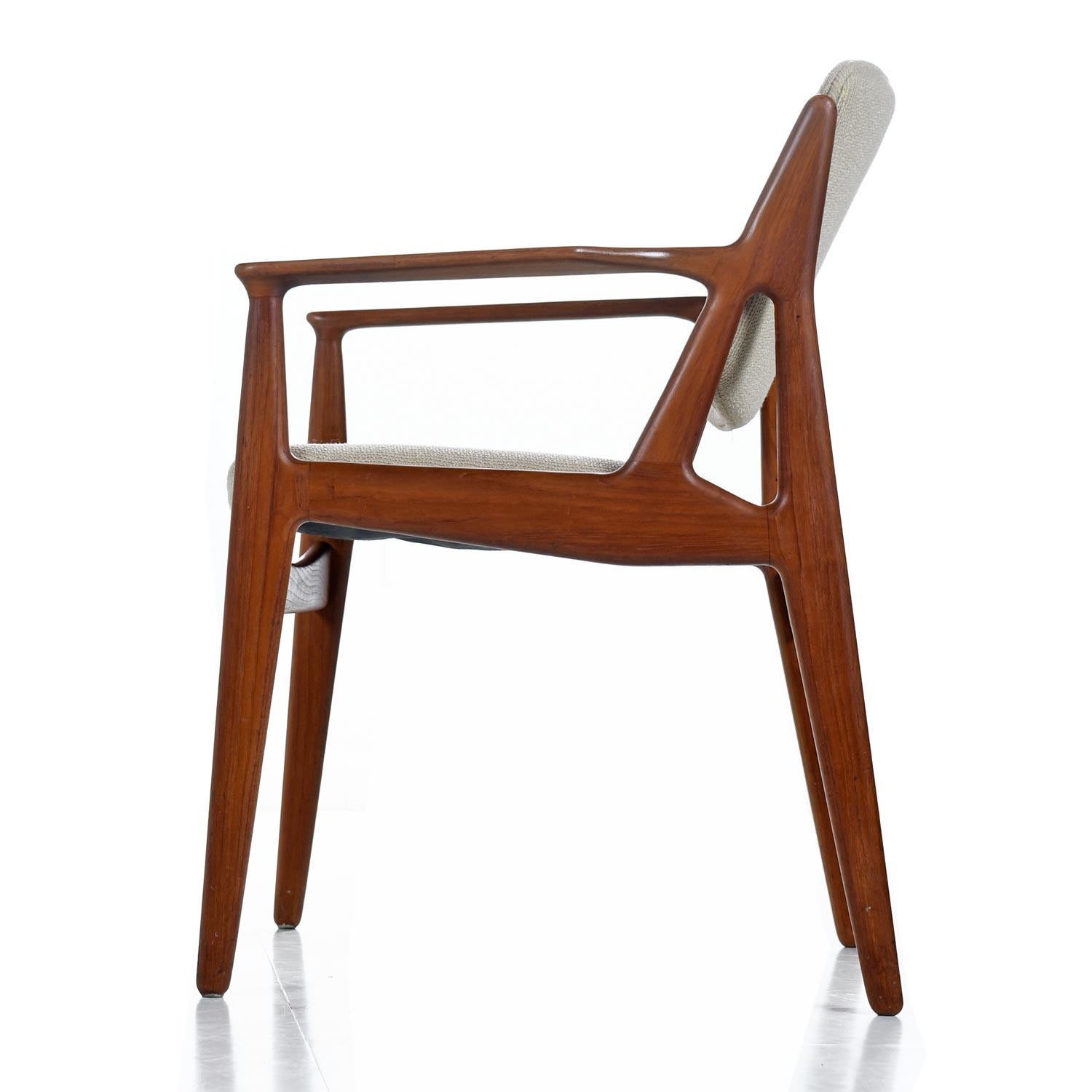 Set of six Mid-Century Modern Danish solid teak dining chairs designed by Arne Vodder for Vamo Sonderborg. The chairs have been recently re-covered in a high quality, nubby beige upholstery. The fabric is age appropriate and soft to the tough. The