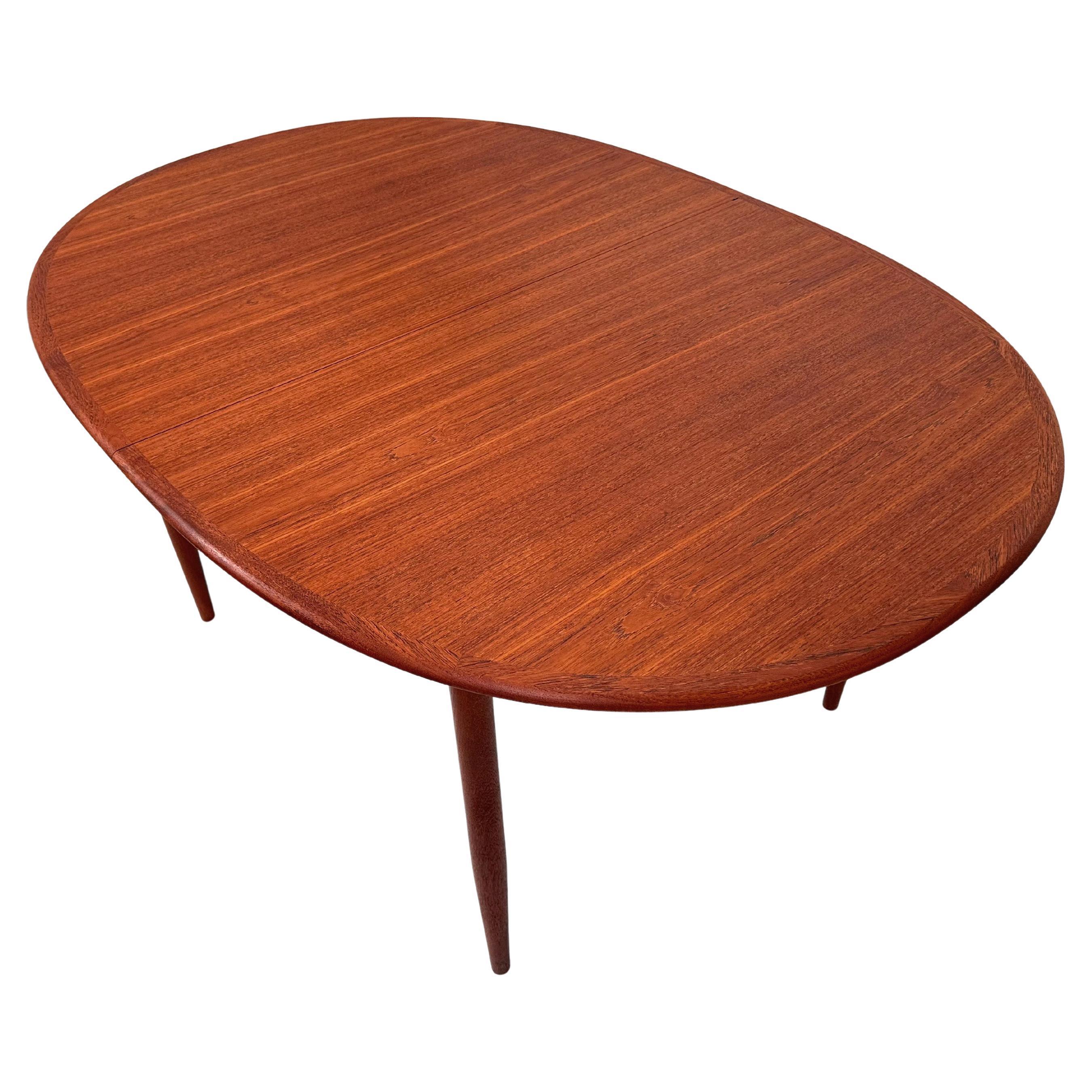 Arne Vodder Extendable Danish Teak Dining Table with 2 Leaves Danés en venta