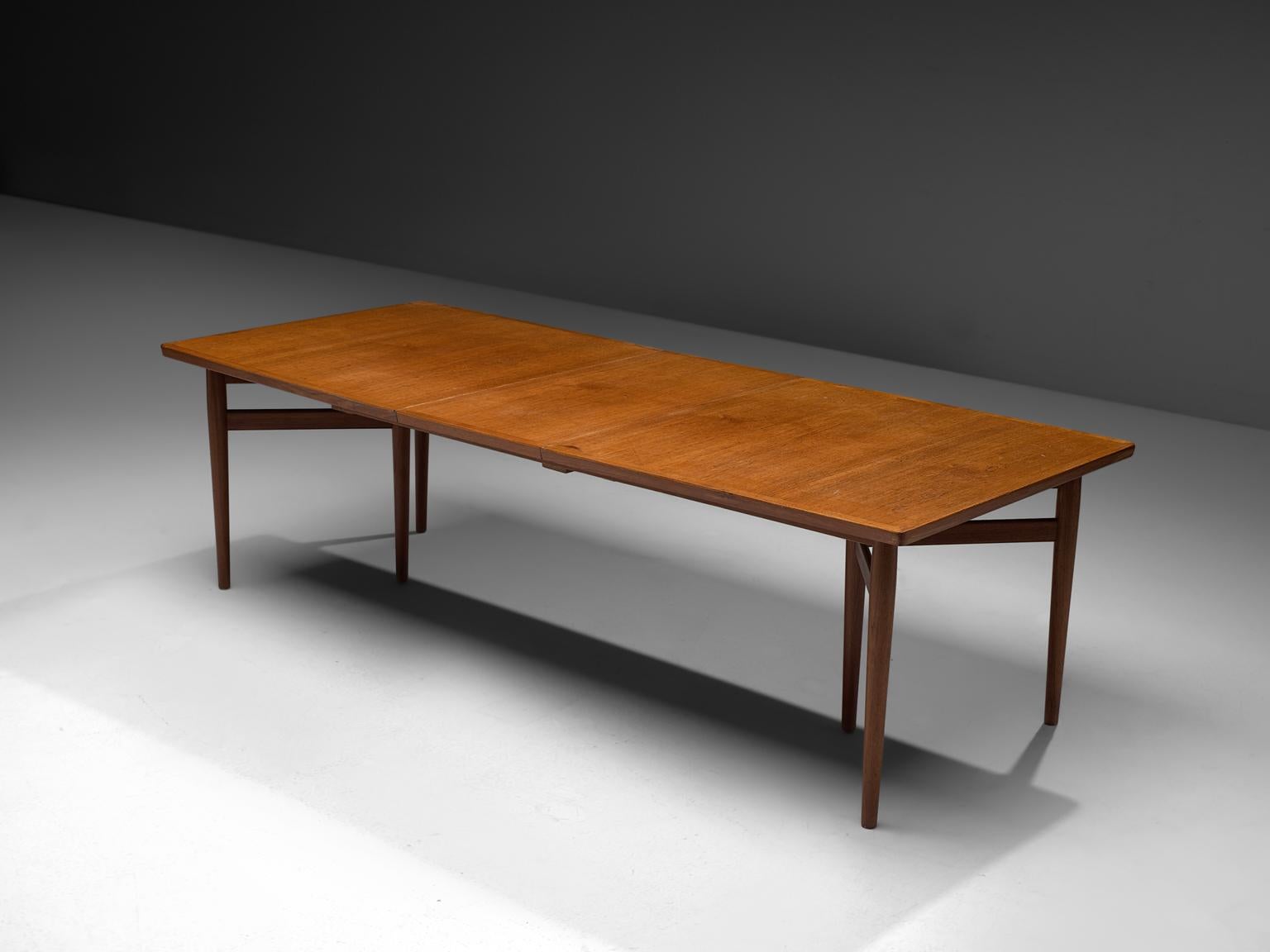 Arne Vodder, extendable dining table, teak, Denmark, 1960s. 

This large conference table by Arne Vodder is a true example of the combination of slender and architectural design with rounded colors and excellent material and craftsmanship. The