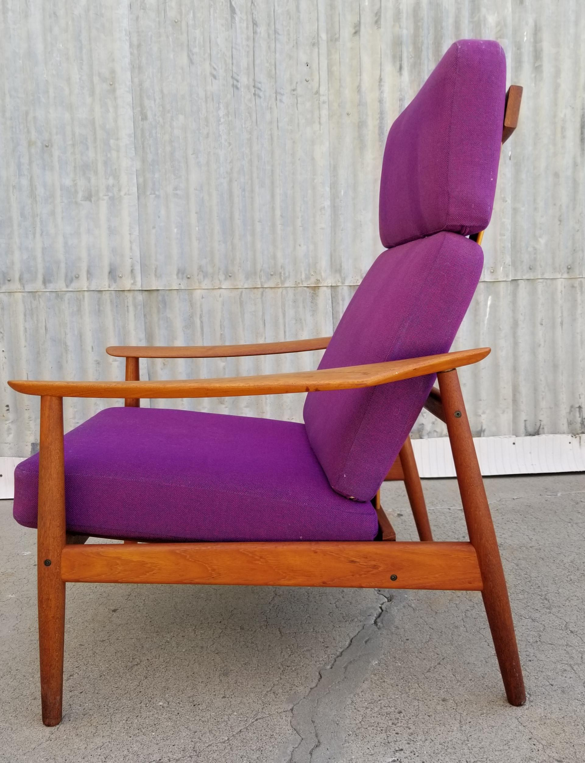 A fine, original example of Arne Vodder's FD 164 adjustable, high back teak lounge chair. Exceptional original vintage condition with original finish and original fabric. Beautiful glow to patina on finish. Retains France & Son and John Stuart