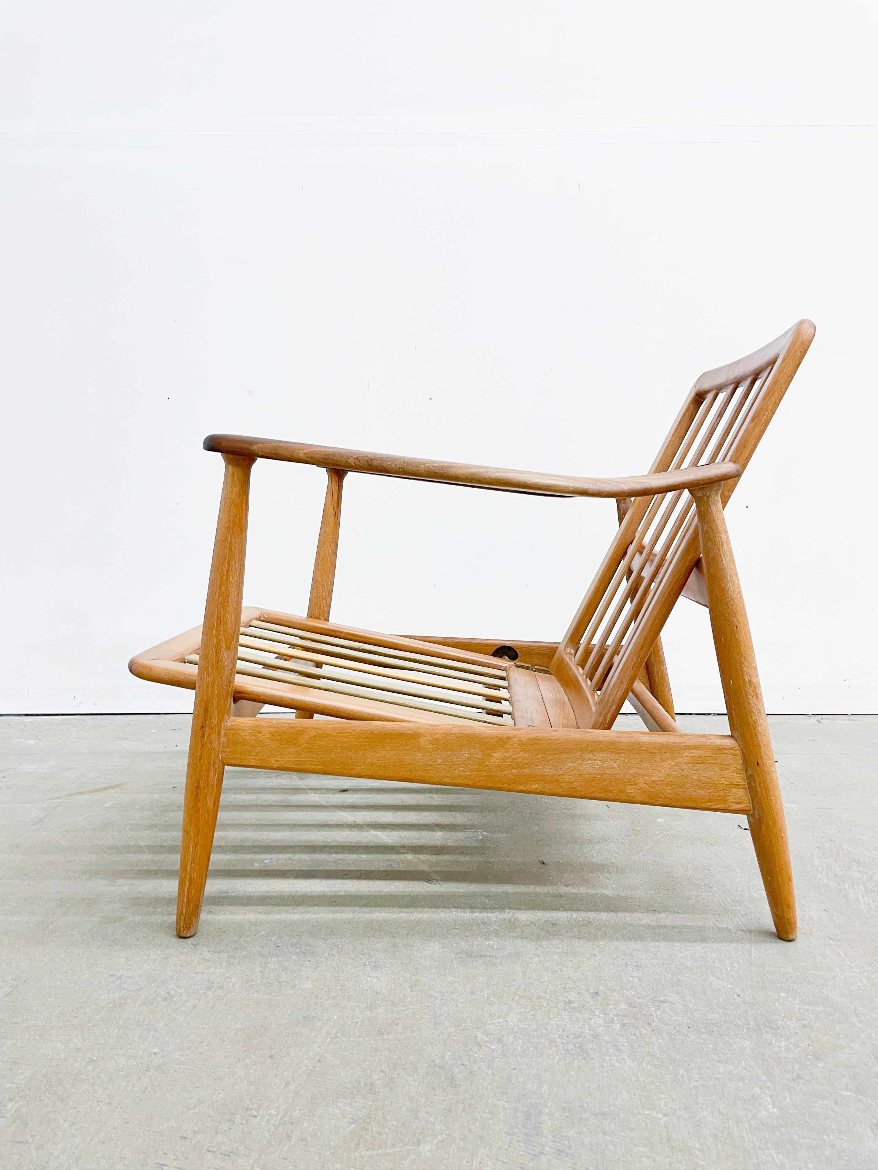 Early mixed wood version of Arne Vodder's lounge chair for Bovirke, made by France and Son in the 1950s. It was sold as Model 161 by F&S. Featuring a Royal Danish Beech frame with Walnut arms attached by wedged tenons joints, this model has two