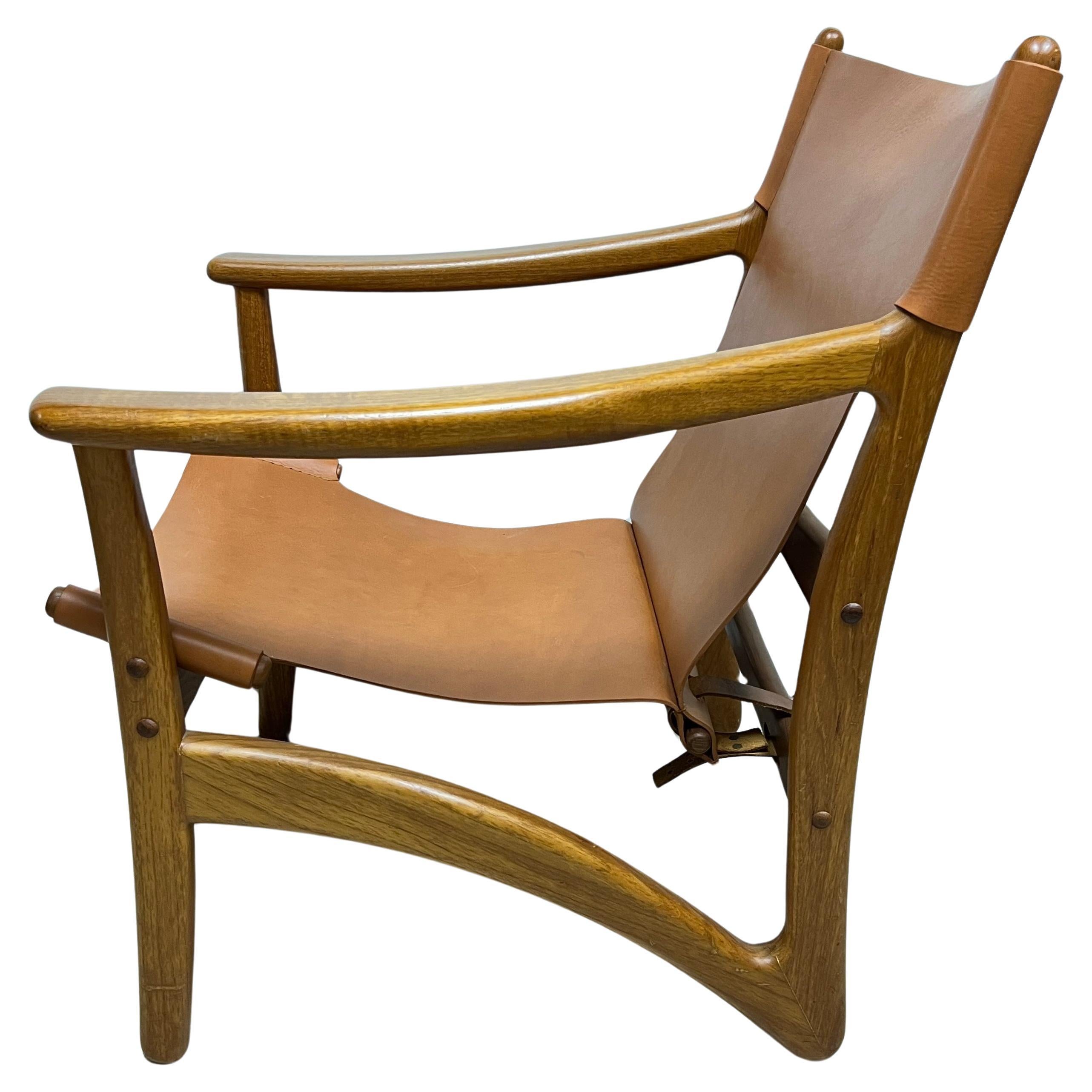 Metà XX secolo Arne Vodder per Kircodan Sedia da salotto danese in teak e pelle cognac 1950s in vendita