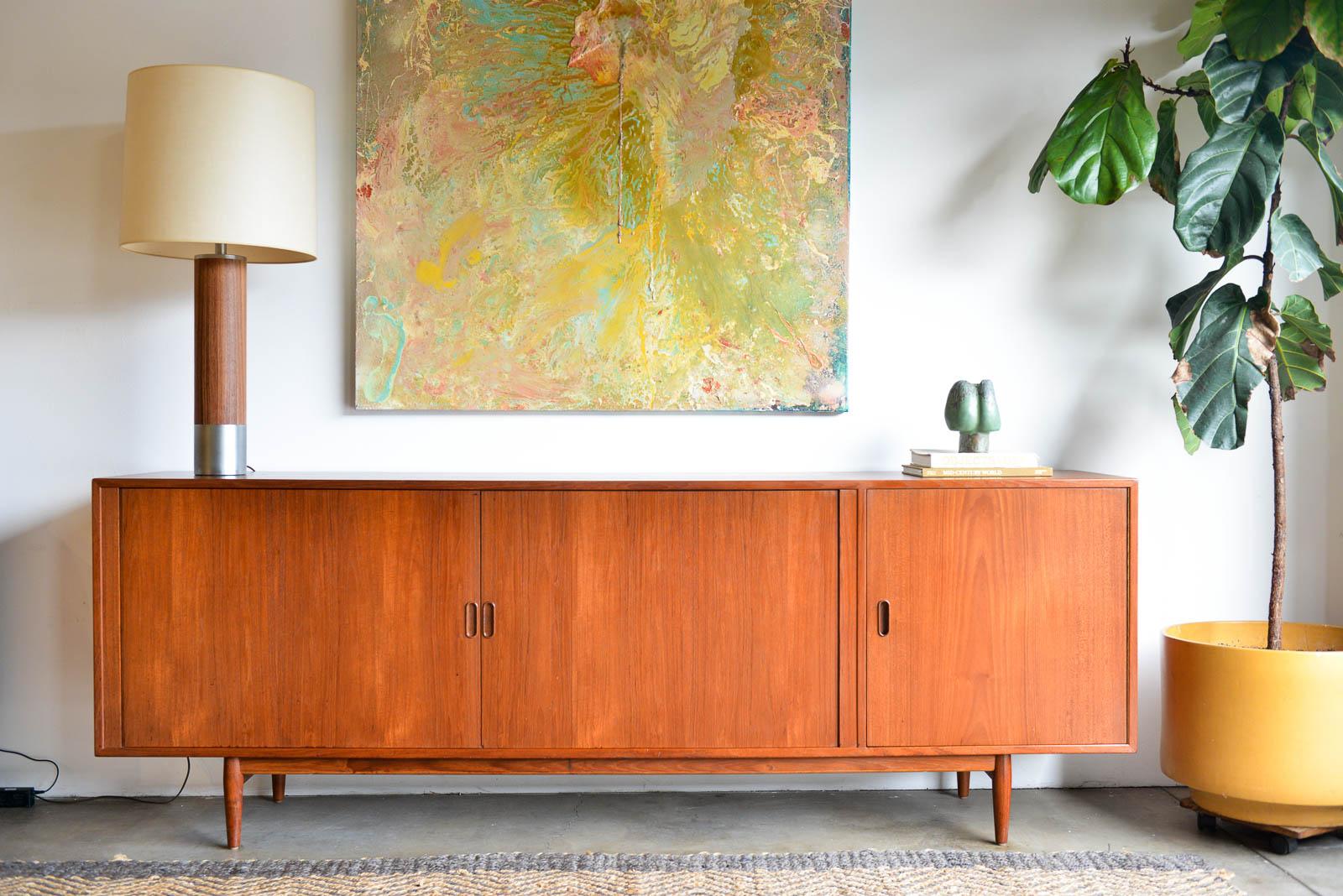 Arne Vodder for Sibast large tambour door credenza, circa 1960. Teak cabinet with two sliding tambour doors and one swing open door on the right. Inside has plenty of storage with adjustable and removable shelving and the right cabinet was