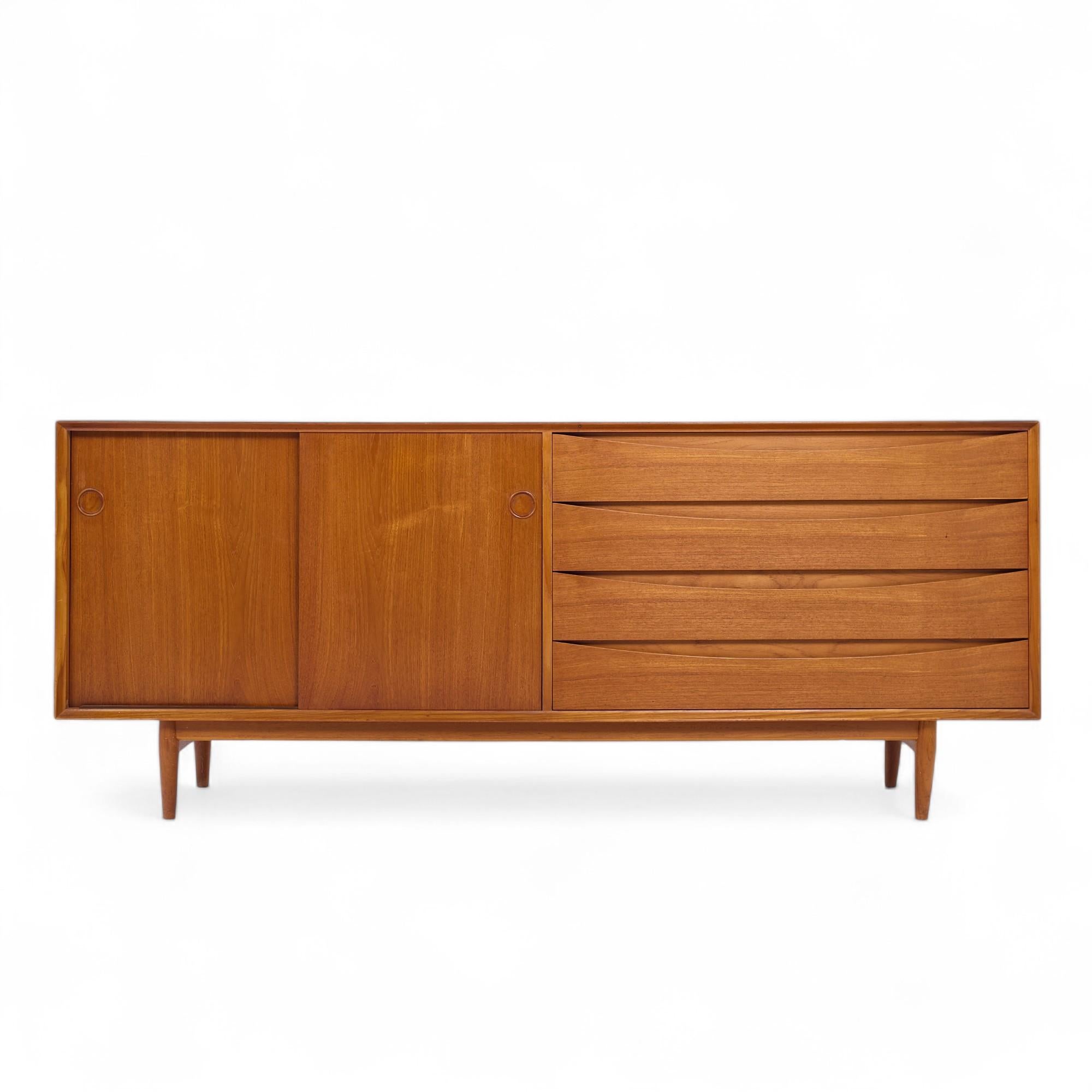 Arne Vodder for Sibast Mid Century Danish Teak Credenza

This credenza measures: 77.5 wide x 19.5 deep x 31.75 inches high

All pieces of furniture can be had in what we call restored vintage condition. That means the piece is restored upon purchase