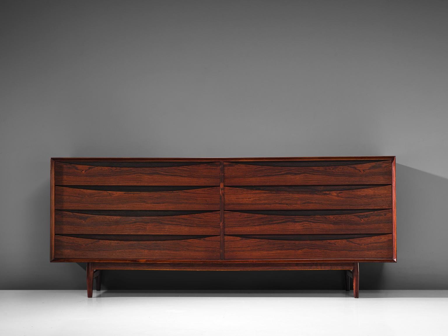 Arne Vodder for Sibast Mobler double dresser, in rosewood, Denmark, 1950s. 

This rosewood double dresser is subtle in it's shape, which projects a feeling of resistance and strength, besides it looking very stylish. This eight drawer double chested