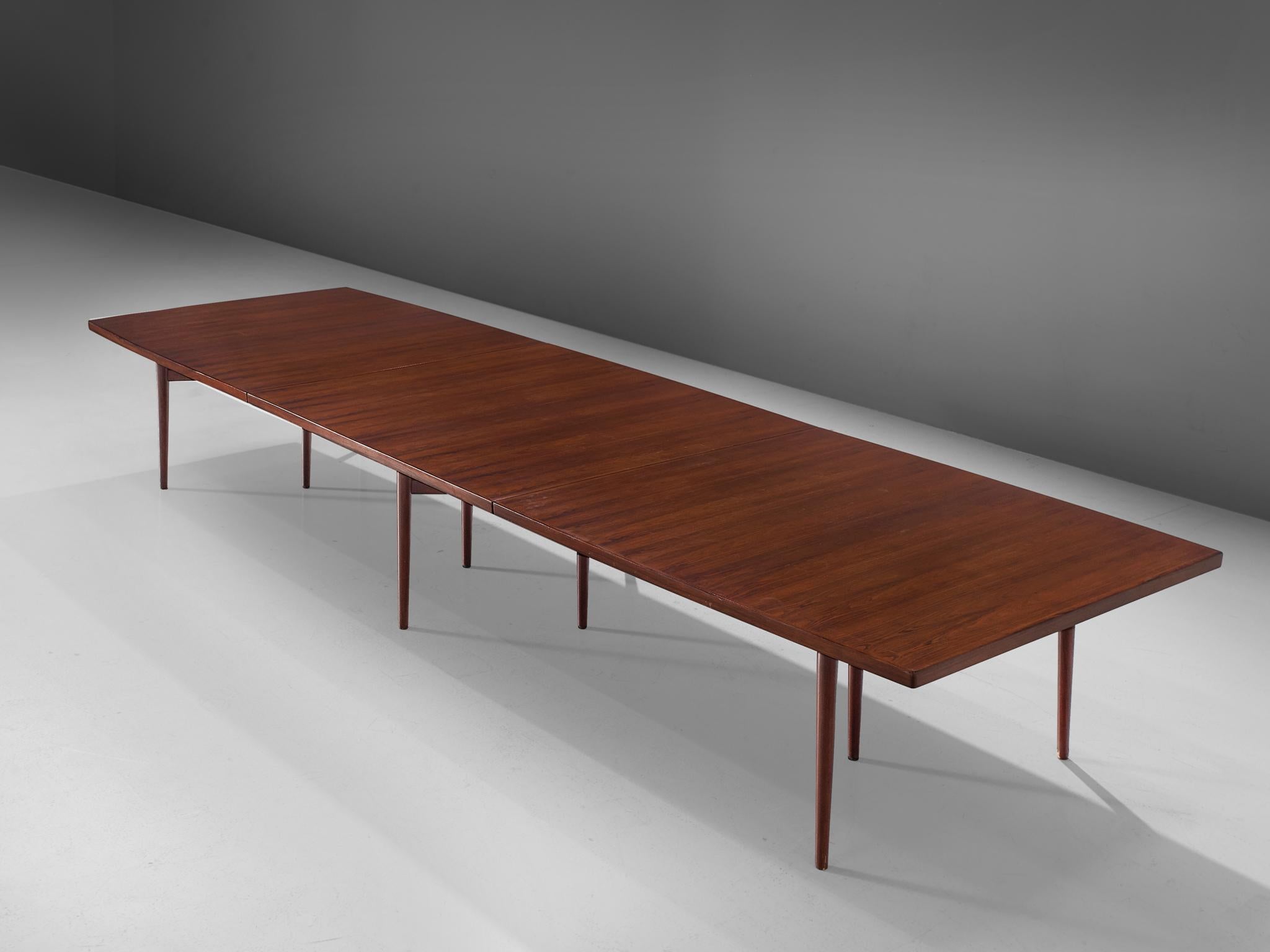 Arne Vodder for Sibast Furniture, rosewood, dining table, Denmark, 1960s.

This dining table or conference table is executed with rosewood veneer. The straight top that is made out of three pieces is supported with a sculptural frame that has three