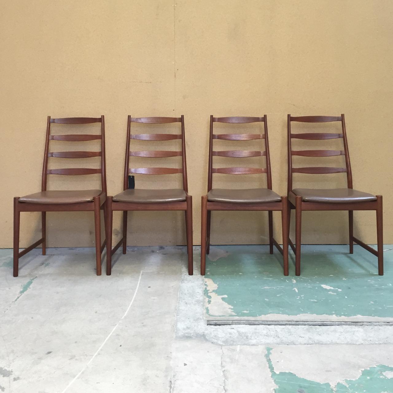 Set of four teak and leather high back dining chairs by Arne Vodder for Vamo Sonderborg, Denmark. In very good condition and original leather seat.