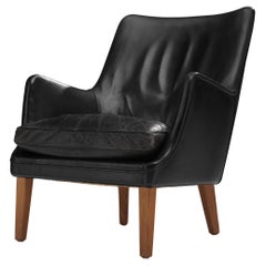 Sillón Arne Vodder de cuero negro patinado original 