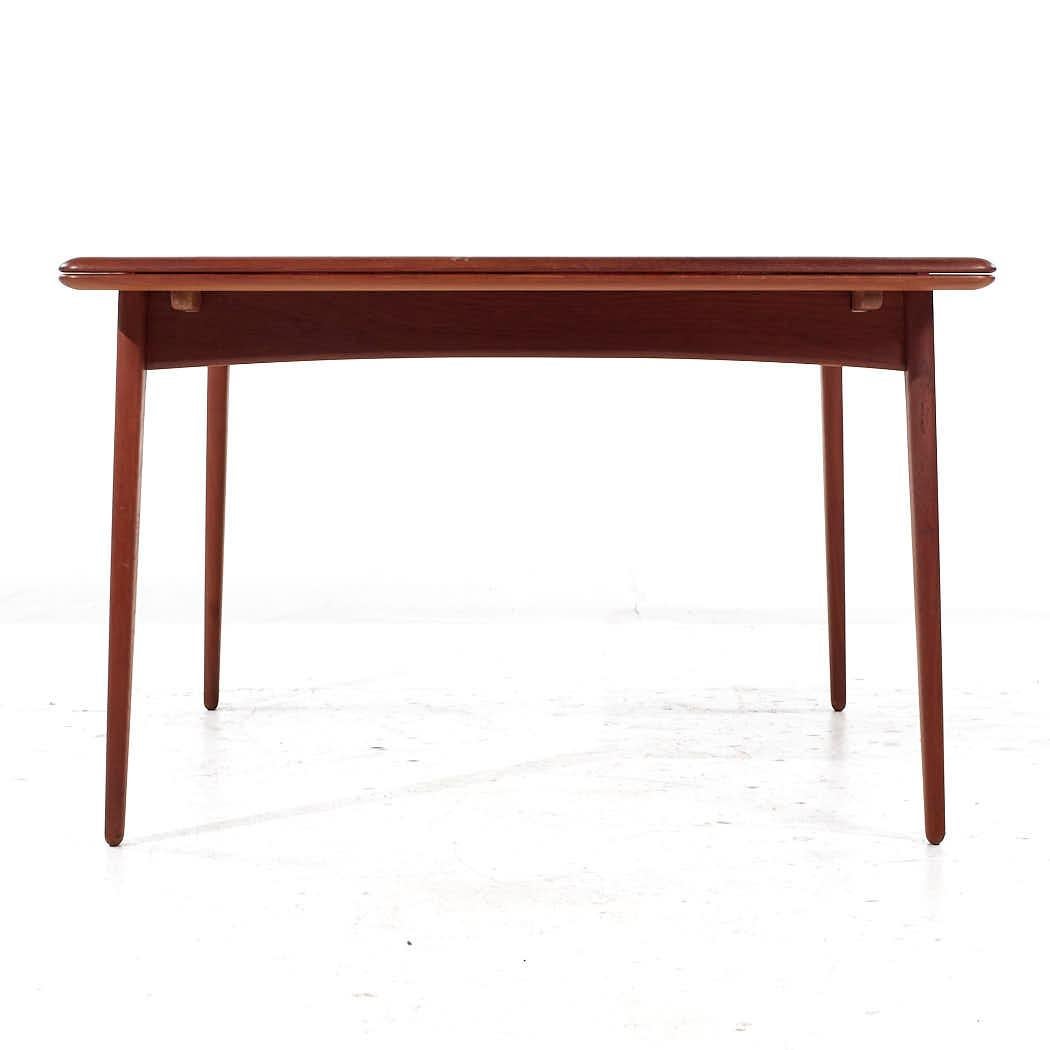 Late 20th Century Arne Vodder Mid Century Danish Teak Hidden Leaf Dining Table For Sale