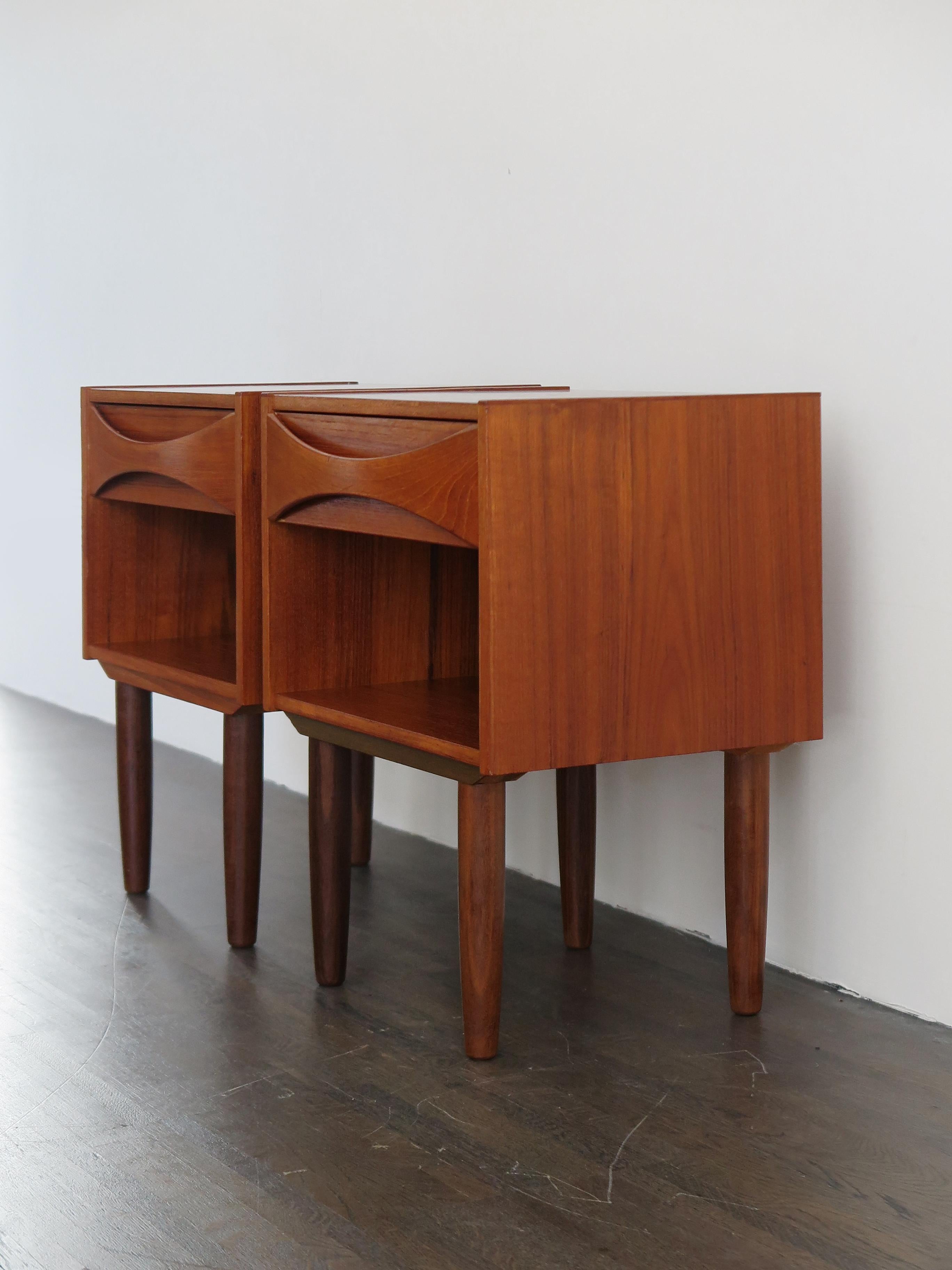 Set of two Scandinavian Mid-Century Modern design teak nightstands
Designed by Arne Vodder and produced in Denmark from circa 1950.

Please note that the items are original of the period and this shows normal signs of age and use.