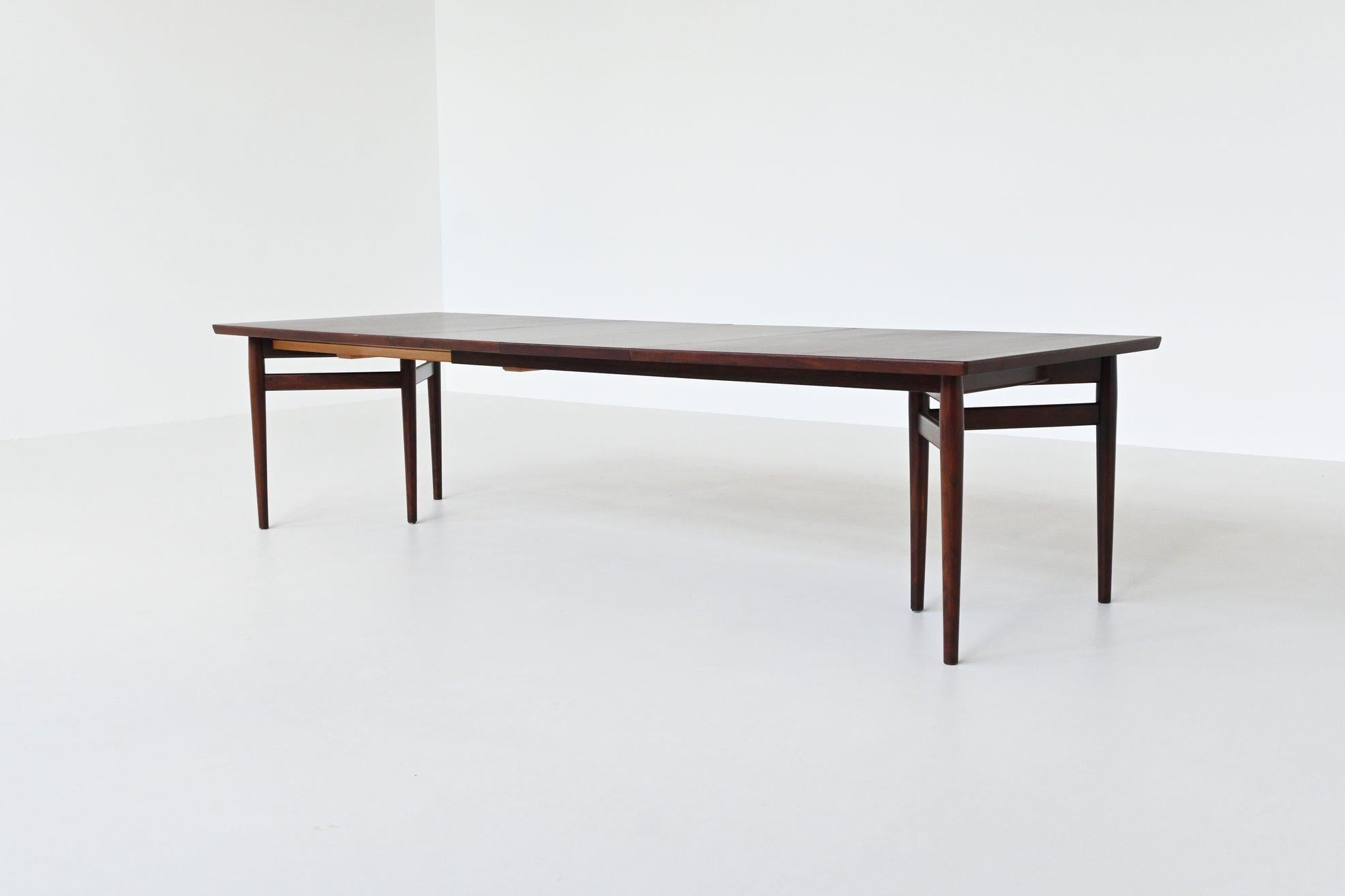 Amazing large conference or dining table model 201 designed by Arne Vodder; one of the best designers Denmark has known and it is manufactured by Sibast Furniture, Denmark 1960. This fantastic table is executed in rosewood, the top is veneered and