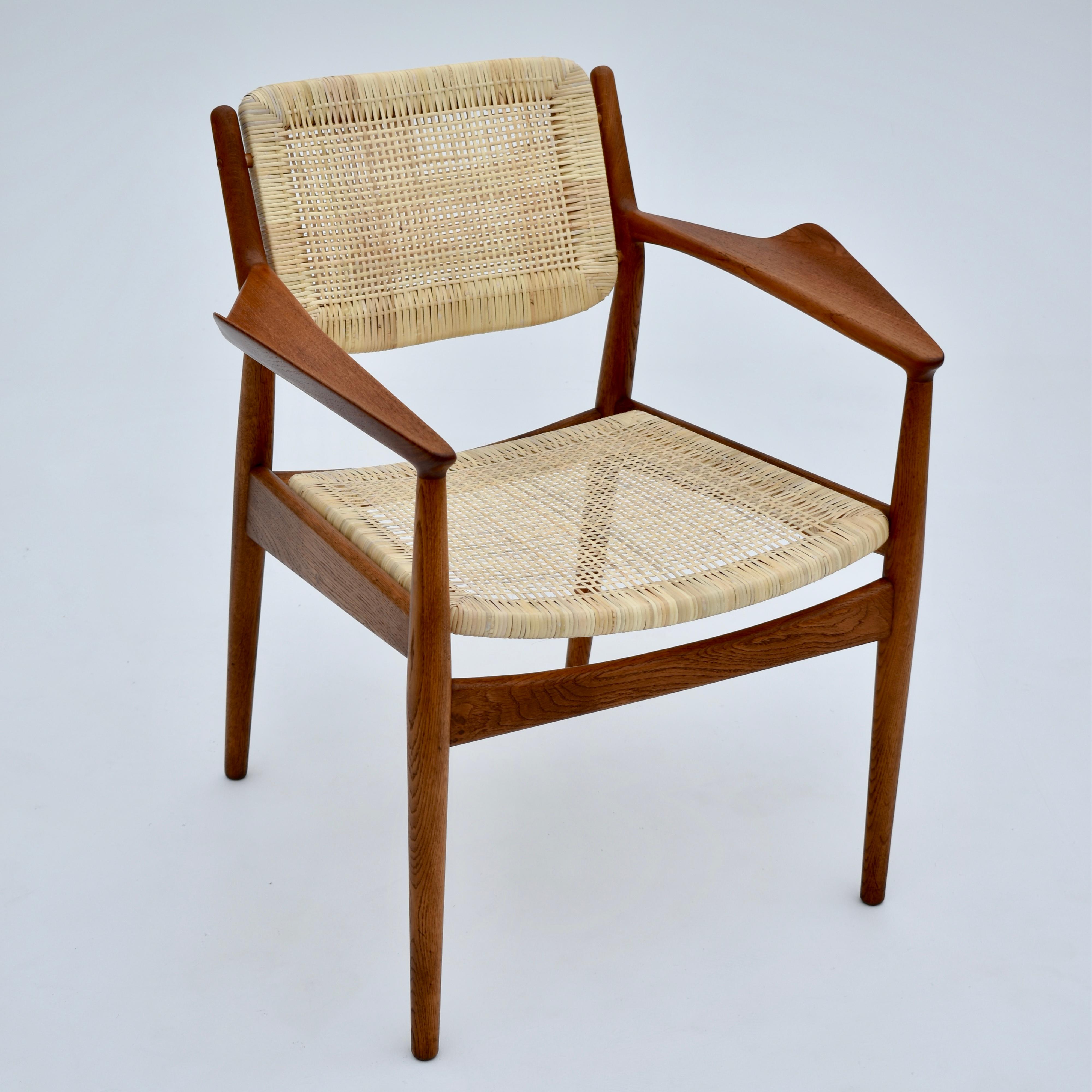 A personal favourite of ours, the model 51a is a very hard to find piece of design. Very few chairs can match the dramatic but delicate aesthetic of this design.

Constructed from solid oak with teak arms and newly woven Rattan seat and backrest,