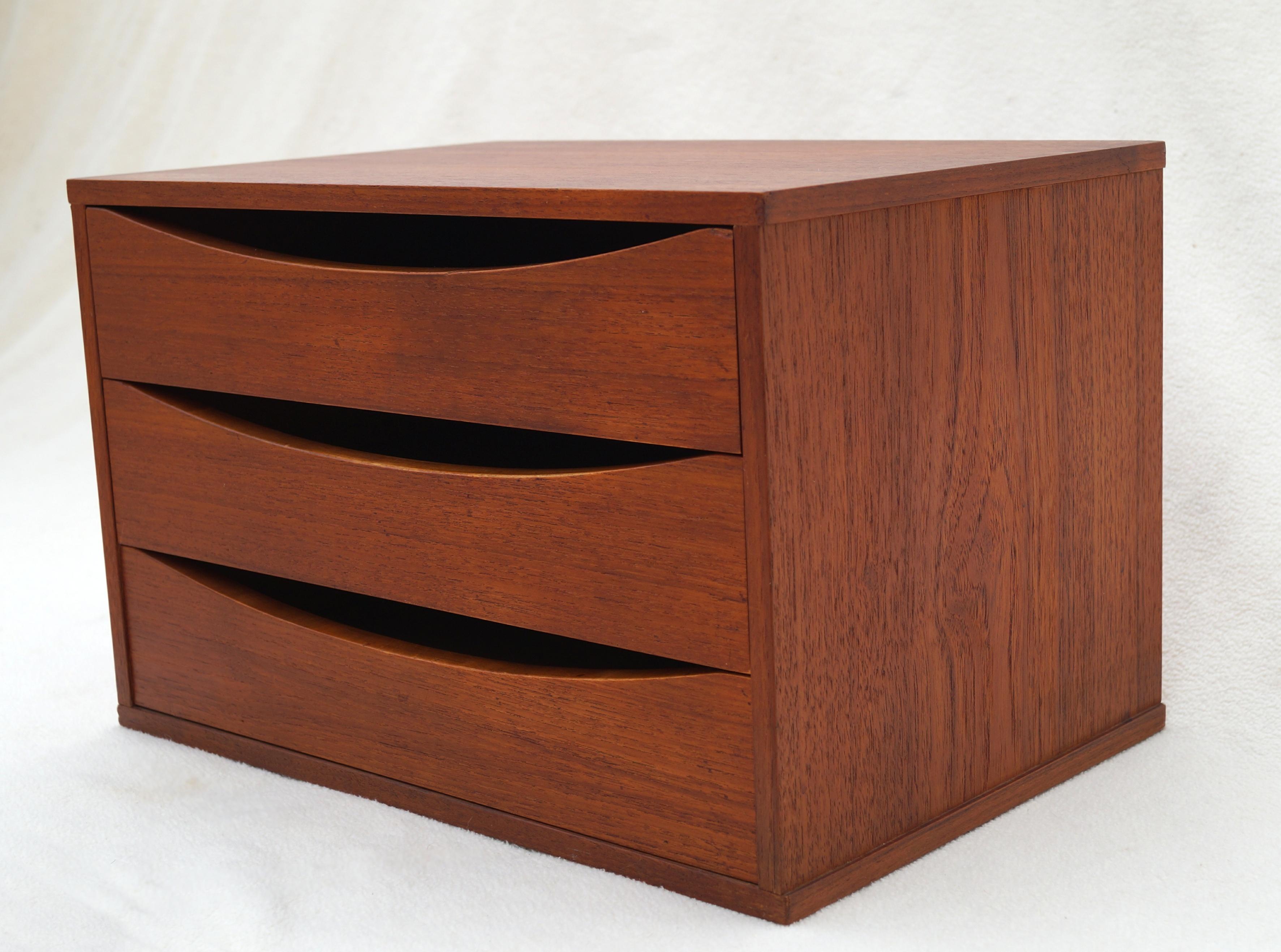 Wonderful aged teak three-drawer organizer.  Beautifully crafted, finished on all sides. This can also be for multiple purposes such as used as jewelry , Makeup , flatware chest , Remote control drawer, Odds and ends drawer for your kitchen or on a