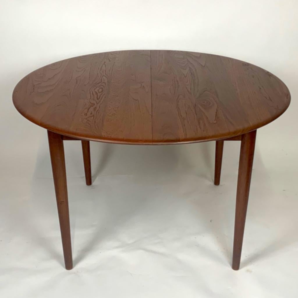 Fantastic Classic 1960s. Round to oval solid teak dining table designed by Arne Vodder. Stunning, Classic midcentury Scandinavian design. 47