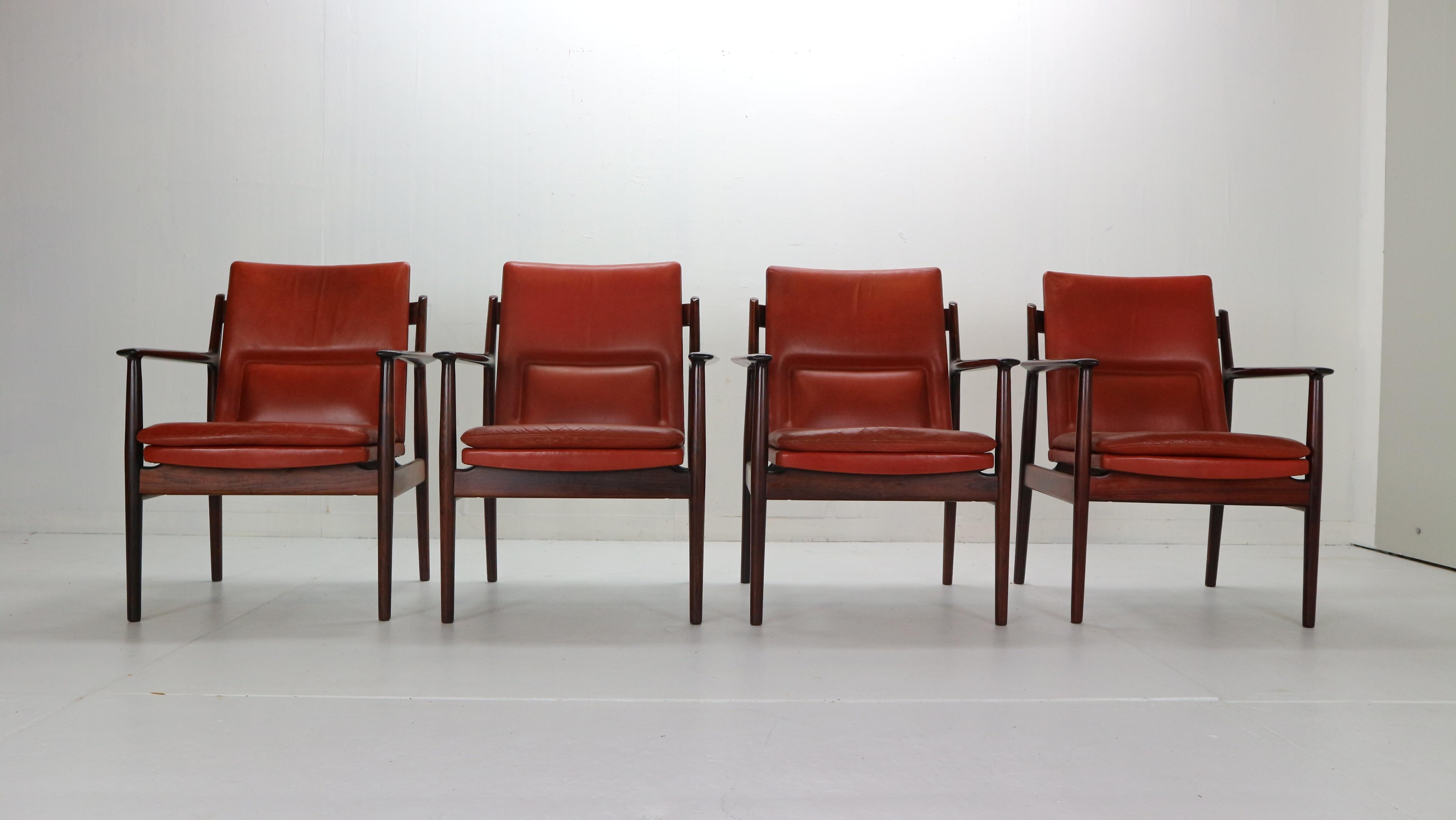Set of four armchairs designed by Arne Vodder for Sibast manufacture in 1960s period, Denmark.
Mid-Century Modern chairs are in original condition and has an original labels under seatings.
The seating is made of red leather and has a beautiful