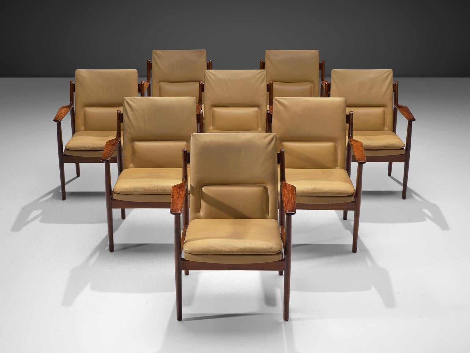 Arne Vodder for Sibast, armchairs model 431, rosewood and natural colored leather, Denmark, 1960s.

This set of 8 chairs is executed in original beige leather and rosewood, designed by the Danish designer Arne Vodder. These chairs are good