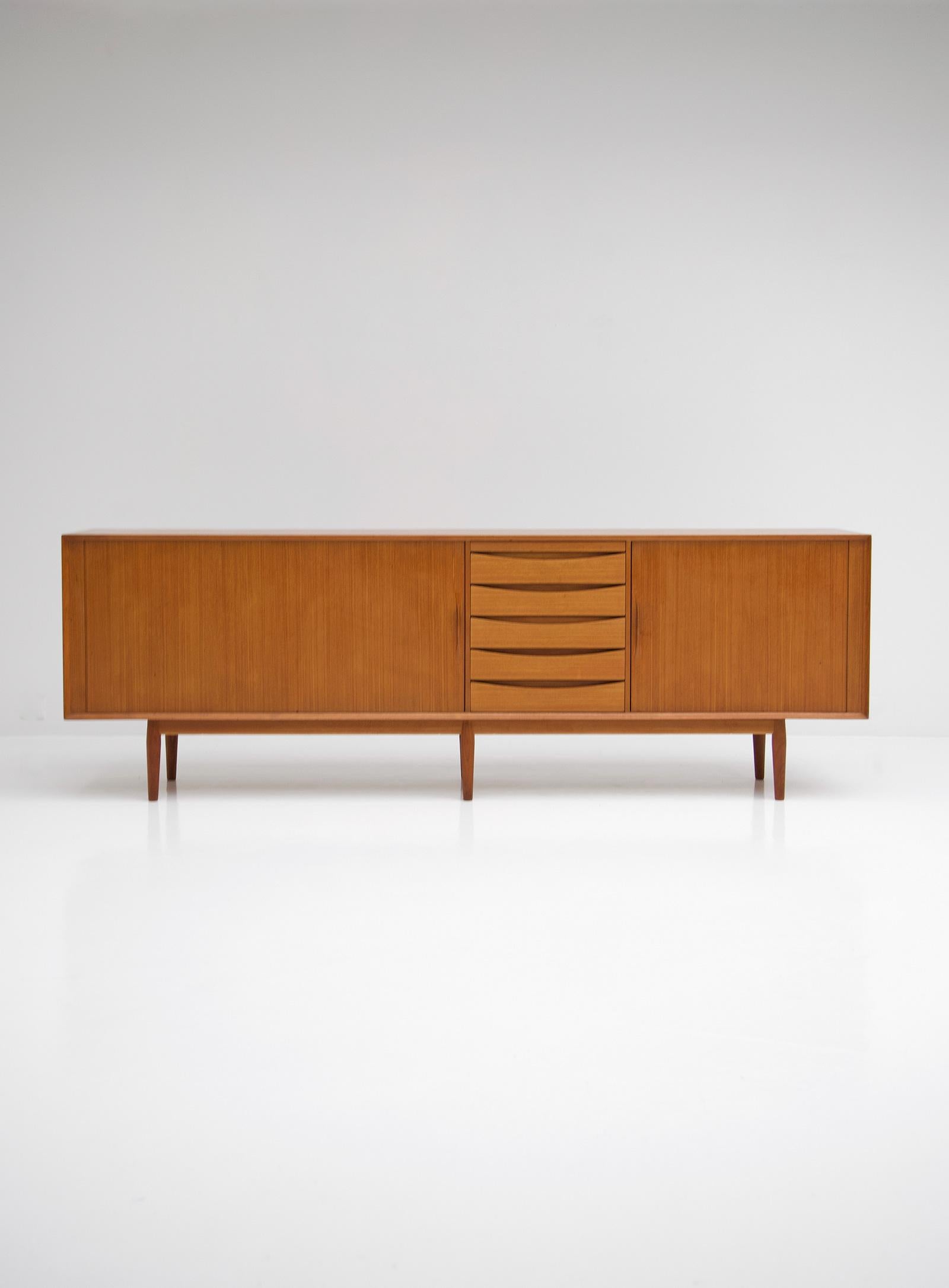 Danish modern credenza, Arne Vodder, Sibast, Denmark 1960s

The Danish architect and designer Arne Vodder was recognized as one of the most important Danish architects of the 20th century . He was especially known for his sideboards, sofas and