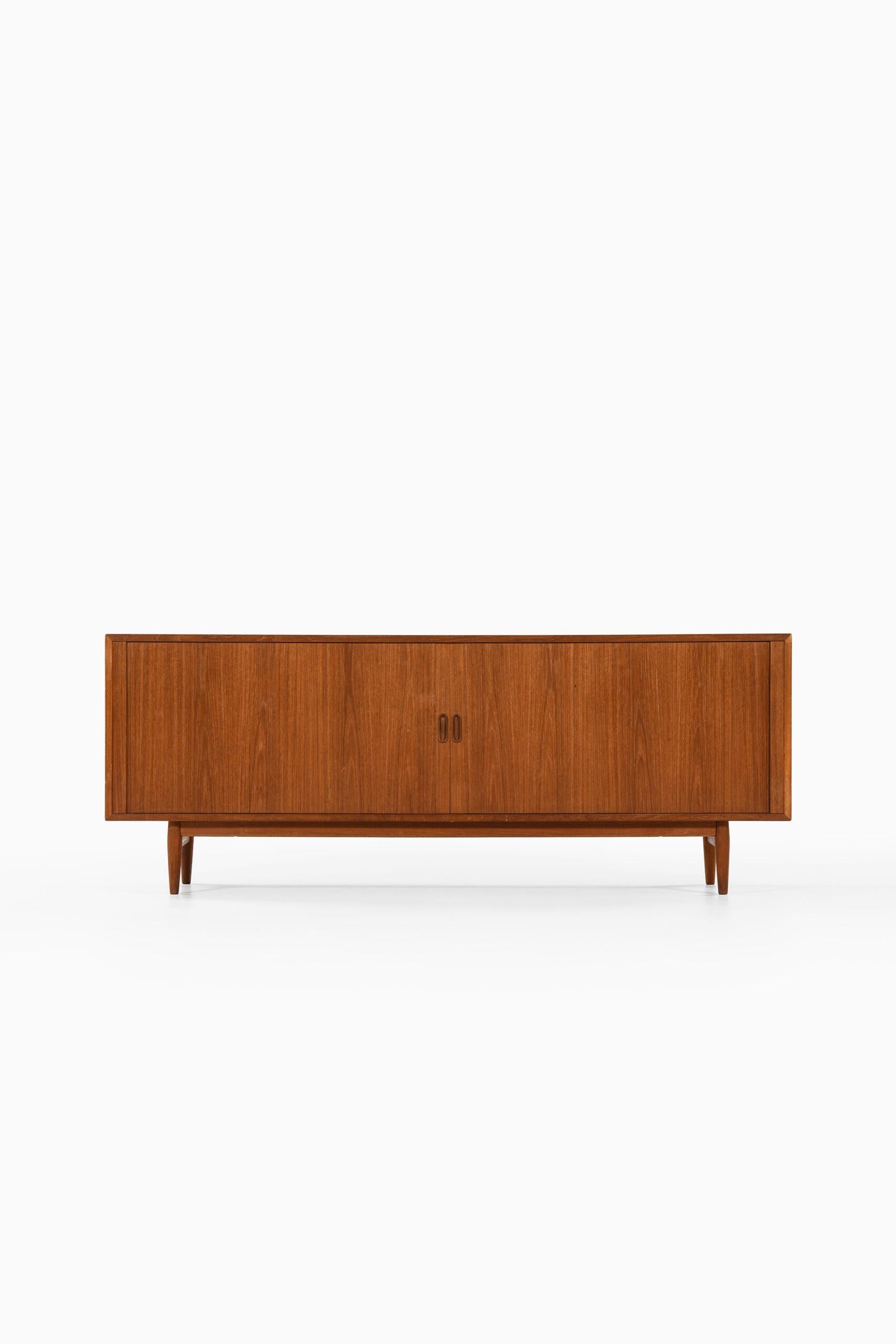 Rare freestanding sideboard with tambour doors designed by Arne Vodder. Produced by Sibast Møbelfabrik in Denmark.