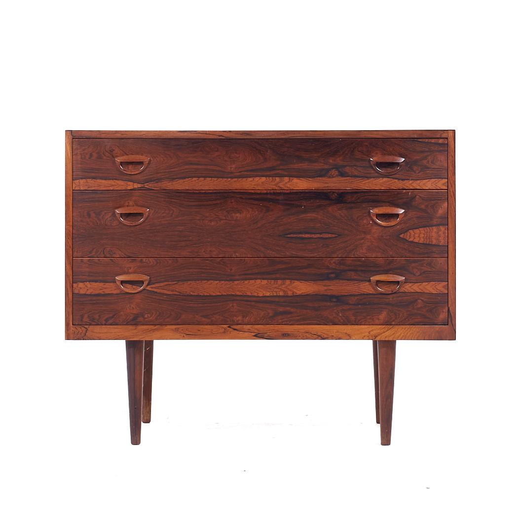Arne Vodder Style Mid Century Danish Rosewood Lowboy Dresser

This lowboy measures: 36 wide x 17.75 deep x 29.25 inches high

All pieces of furniture can be had in what we call restored vintage condition. That means the piece is restored upon