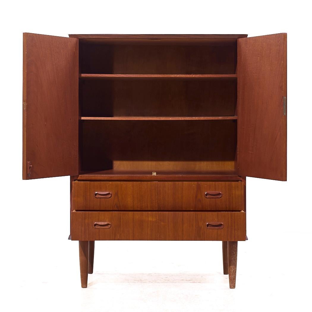 Fine XX secolo Arne Vodder - Armoire in teak danese di metà secolo in vendita