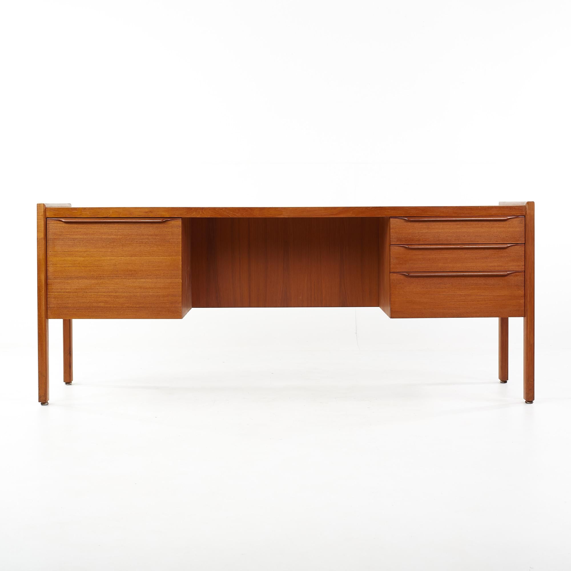 Arne Vodder Style mid century teak office credenza

This credenza measures: 72 wide x 21 deep x 29 inches high

All pieces of furniture can be had in what we call restored vintage condition. That means the piece is restored upon purchase so it’s