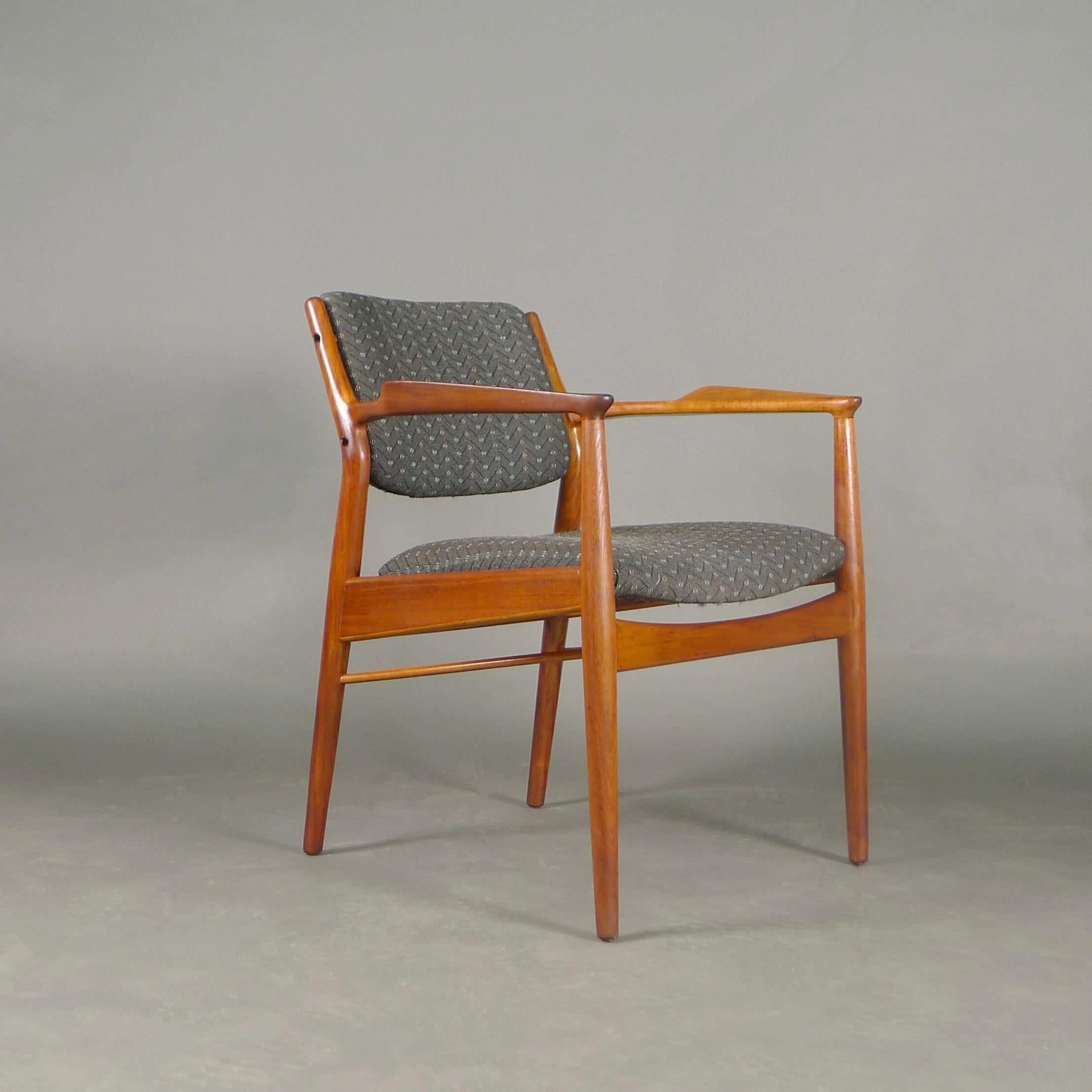 Arne Vodder (1926-2009)
Model 51 Armchair
teak and upholstery
made by Sibast, Denmark 1950s

This beautiful teak armchair has gently contoured arms which are a design feature as well as providing ergonomic support.  The upholstery is dark grey