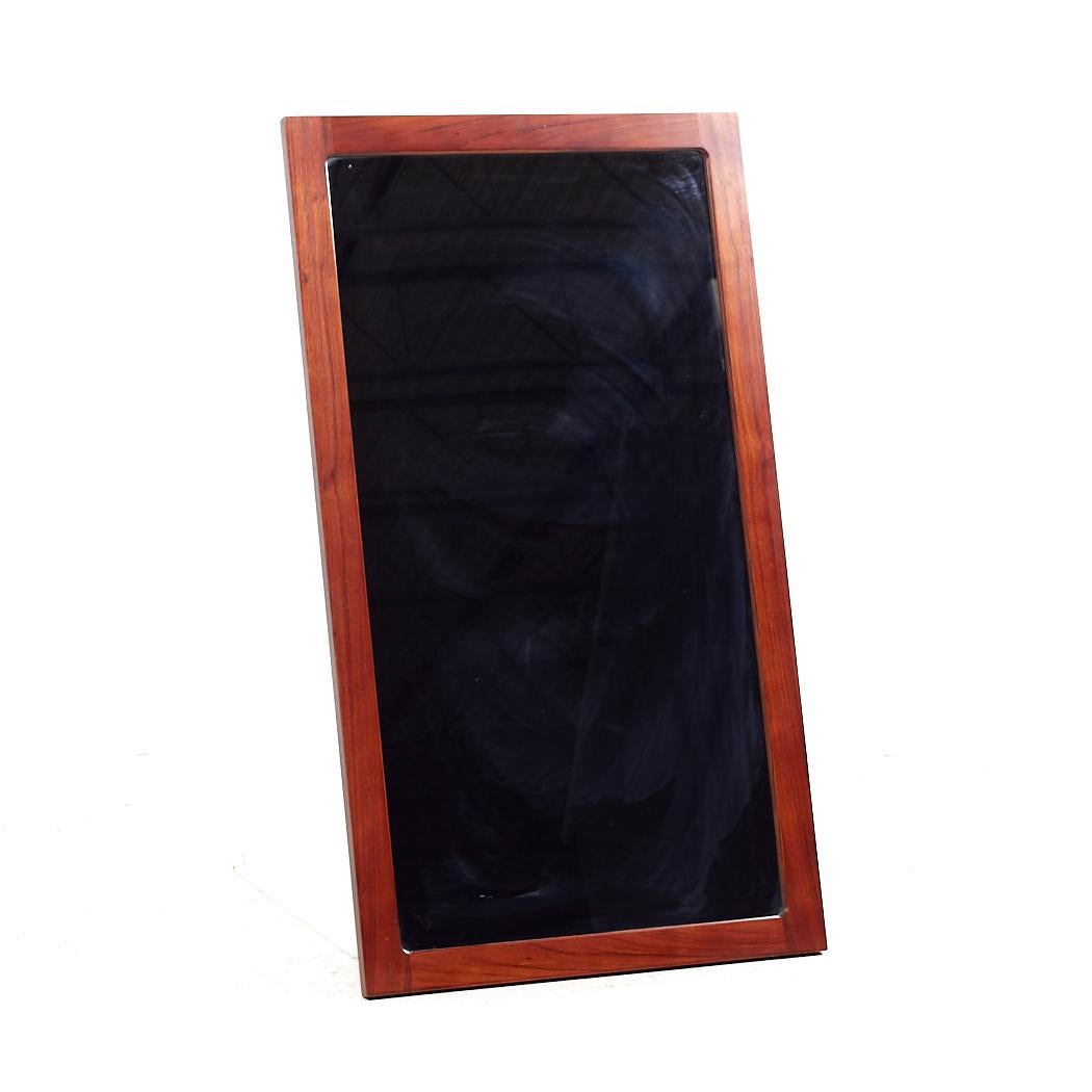 Arne Wahl Iversen Mid Century Rosewood Mirror

This mirror measures: 23.25 wide x 1 deep x 41.5 inches high

All pieces of furniture can be had in what we call restored vintage condition. That means the piece is restored upon purchase so it’s free