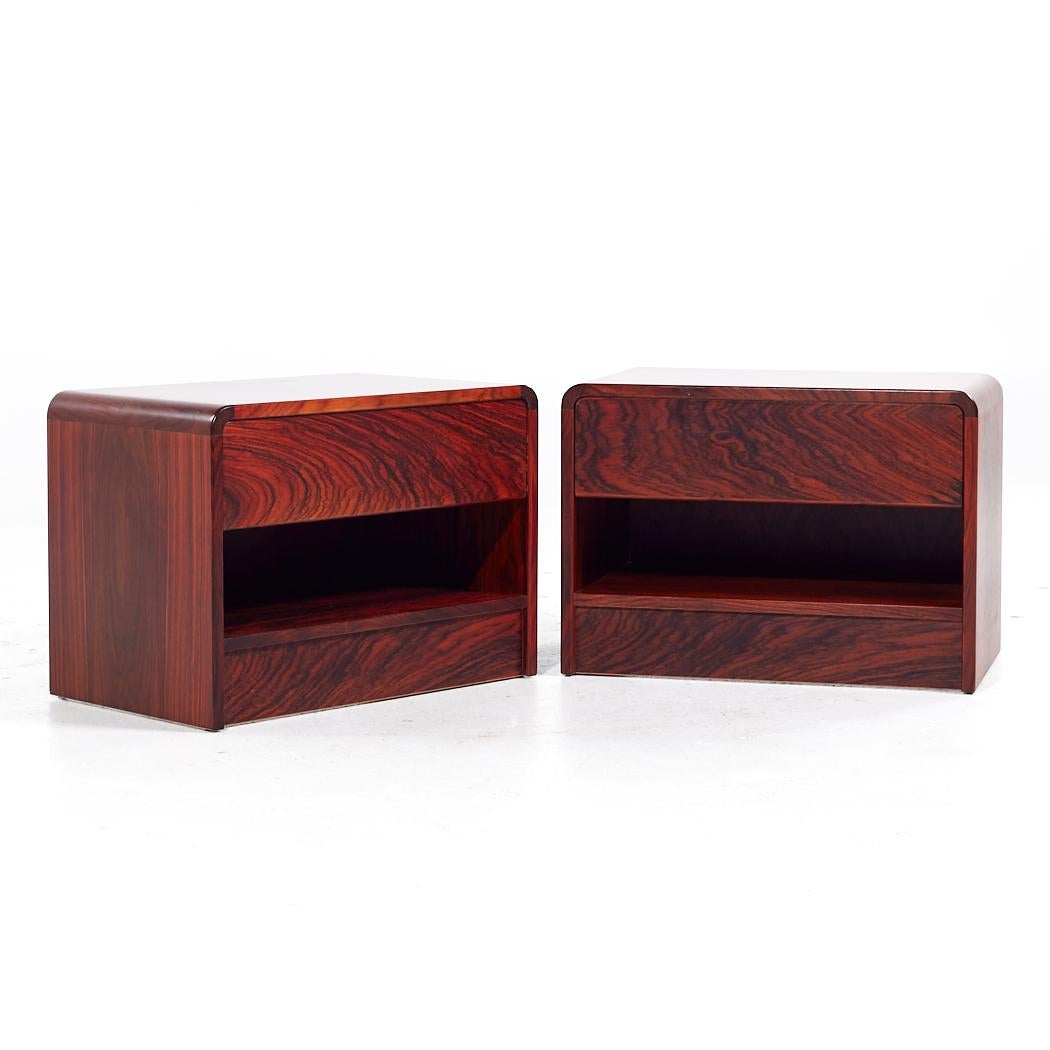 Arne Wahl Iversen Mid Century Rosewood Nightstands - Pair 

Each nightstand measures: 23.25 wide x 14.25 deep x 16.5 inches high

All pieces of furniture can be had in what we call restored vintage condition. That means the piece is restored upon