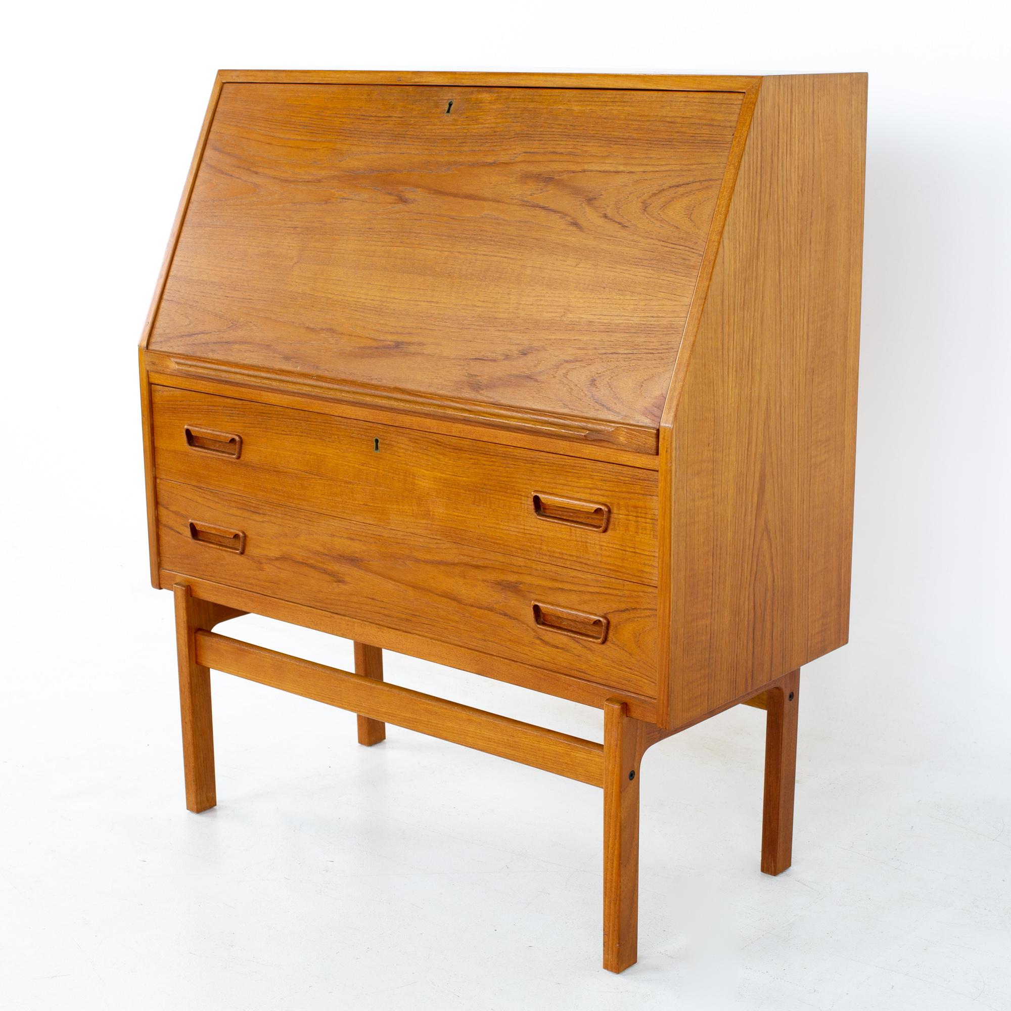 Arne Wahl Iversen Model 68 mid century Danish teak drop front secretary bar desk
Desk measures: 37.5 wide x 17.5 deep x 33.5 inches high

All pieces of furniture can be had in what we call restored vintage condition. That means the piece is