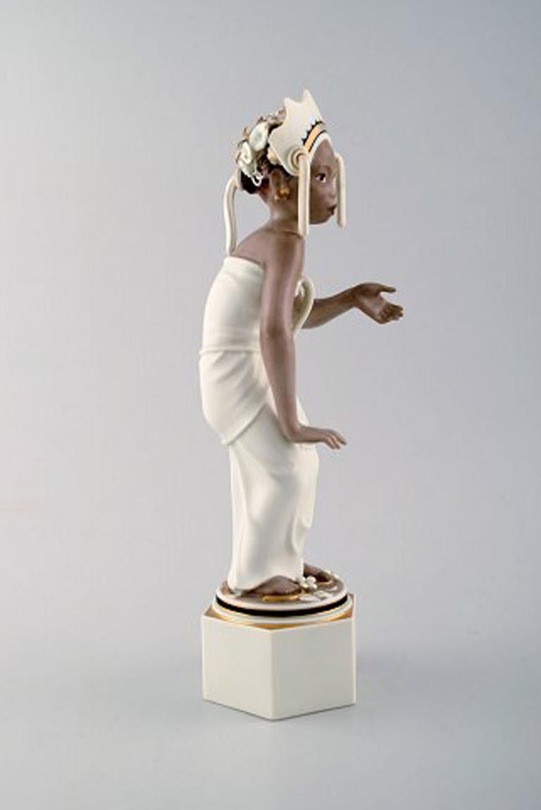 Arno Malinowski for Royal Copenhagen, number 12238. Bali girl. Very rare porcelain figurine in overglaze.
In fair condition. A minor chip and glued.
Measures: 26.5 cm. x 9.5 cm.
Stamped. Juliane Marie.
