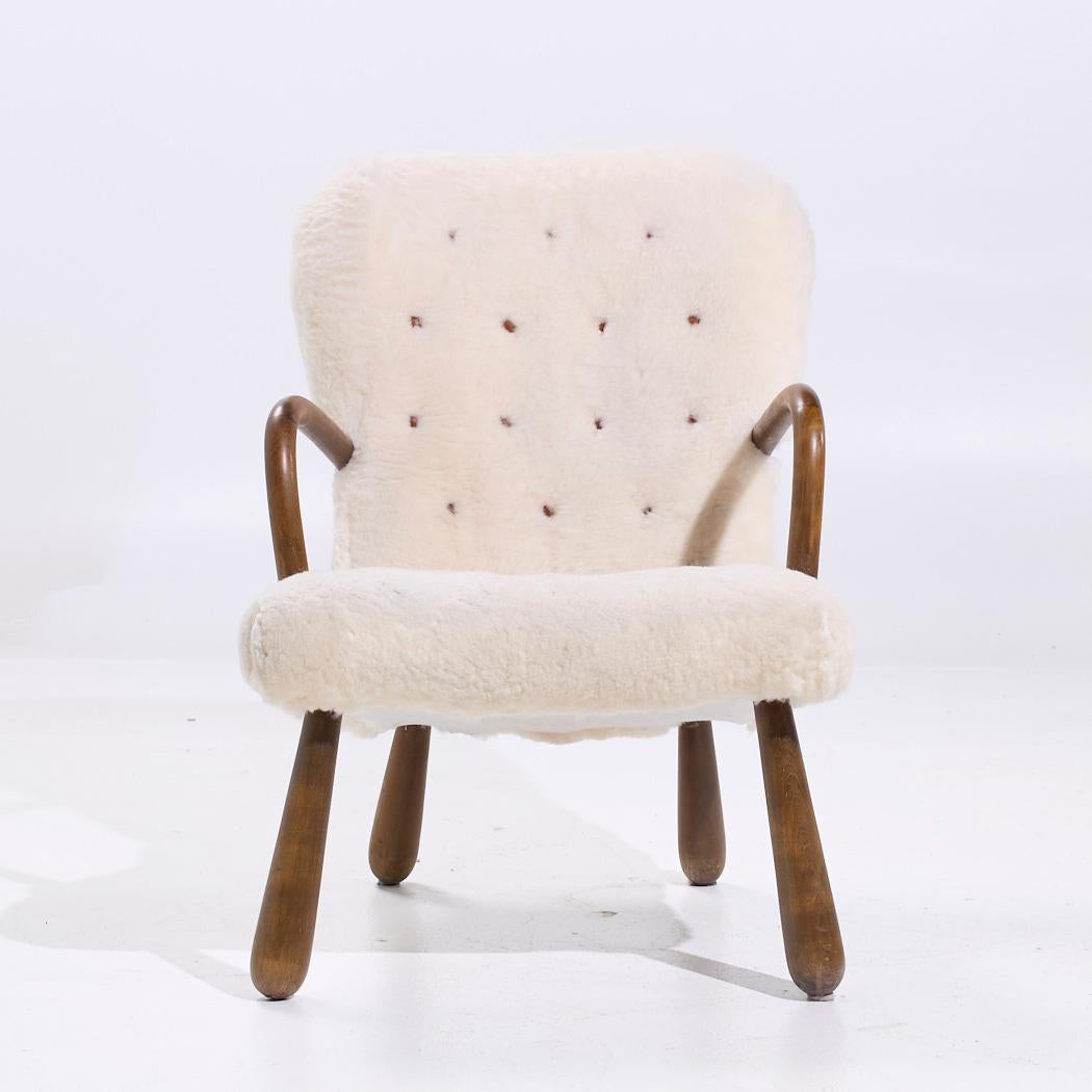 Arnold Madsen for Madsen & Schübel Mid Century Danish Clam Chair

This lounge chair measures: 23.5 wide x 32 deep x 33.5 high, with a seat height of 16 and arm height/chair clearance 23 inches

All pieces of furniture can be had in what we call
