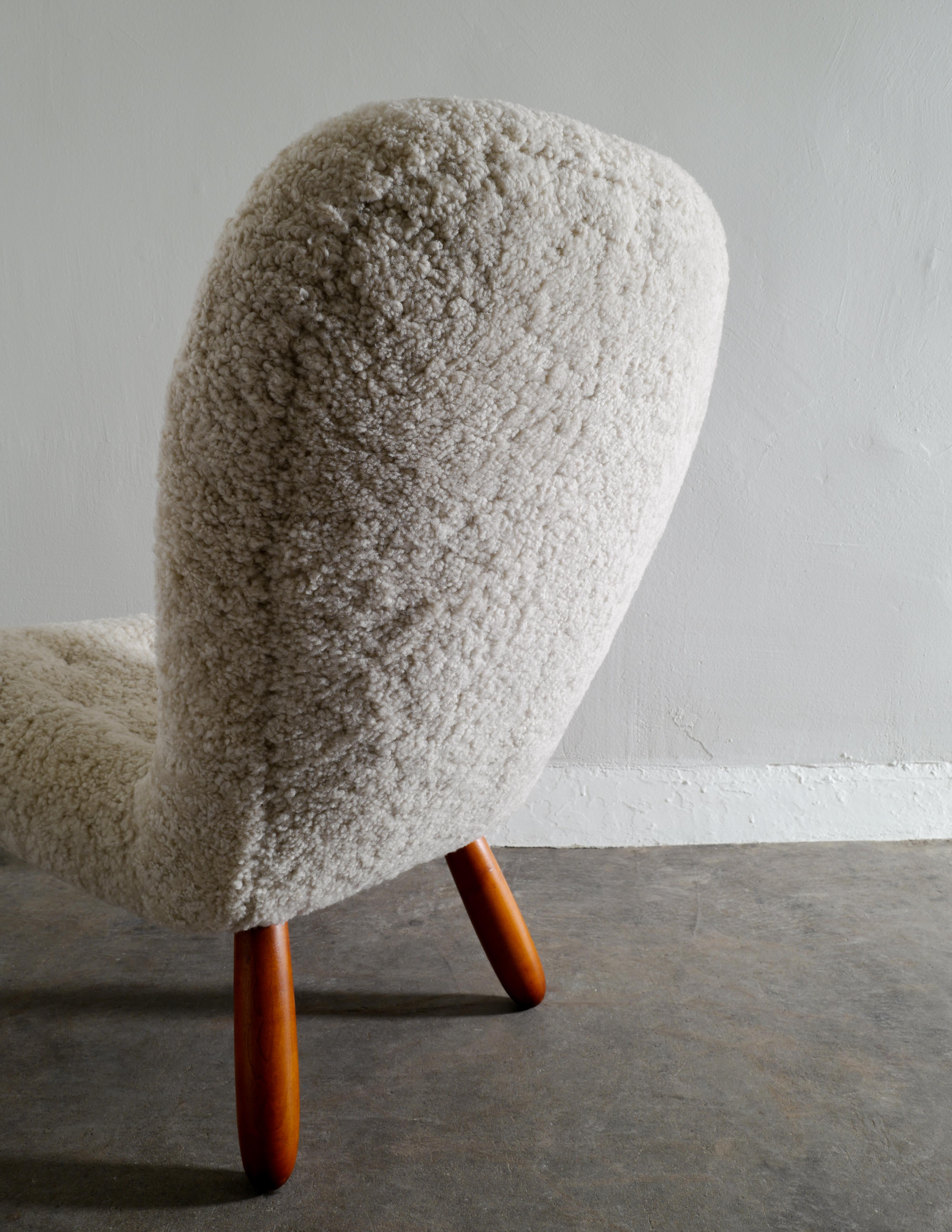 Scandinavian Modern Arnold Madsen / Philip Arctander Clam Chair in Sheepskin Prod in Denmark, 1940s