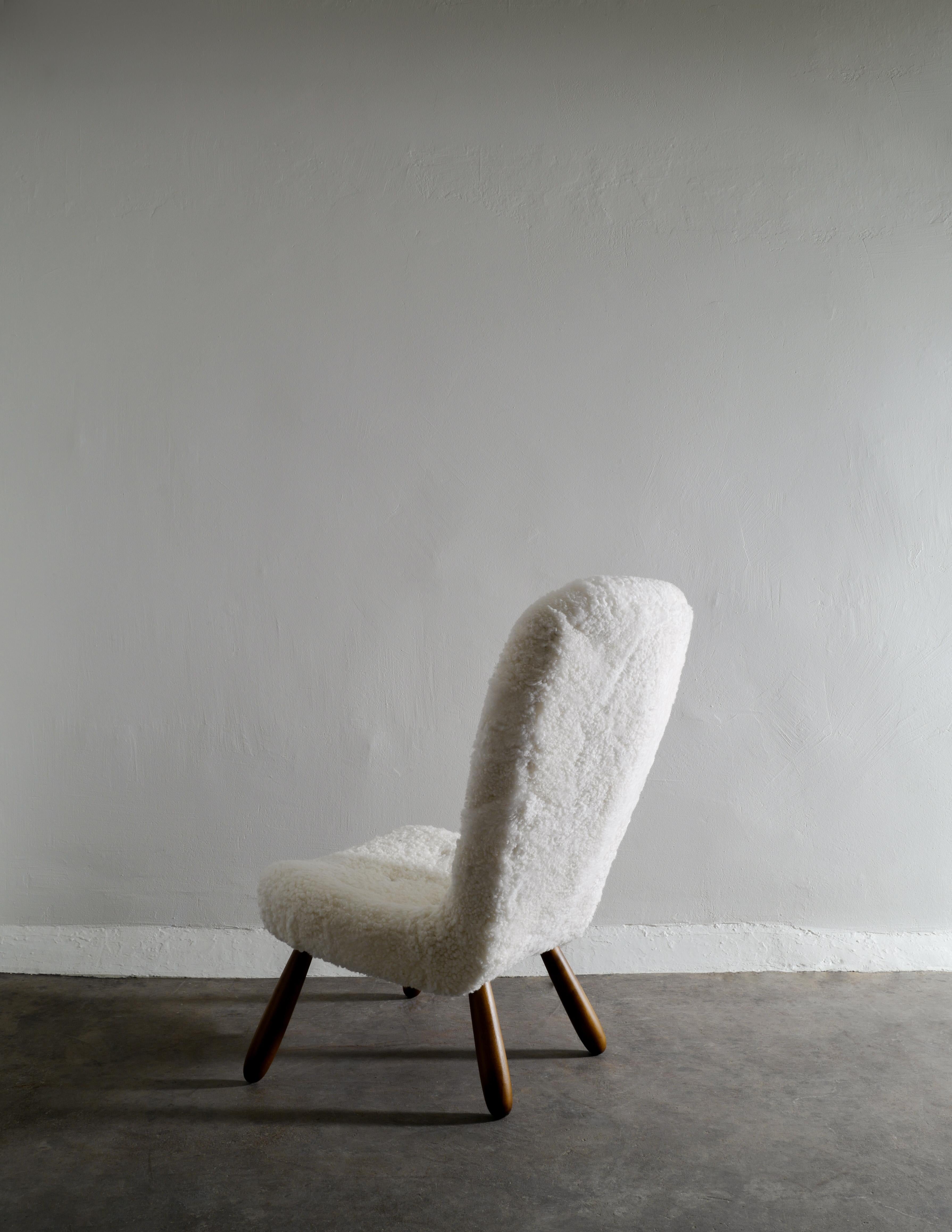 Scandinavian Modern Arnold Madsen / Philip Arctander Clam Chair in Sheepskin Prod in Denmark, 1940s
