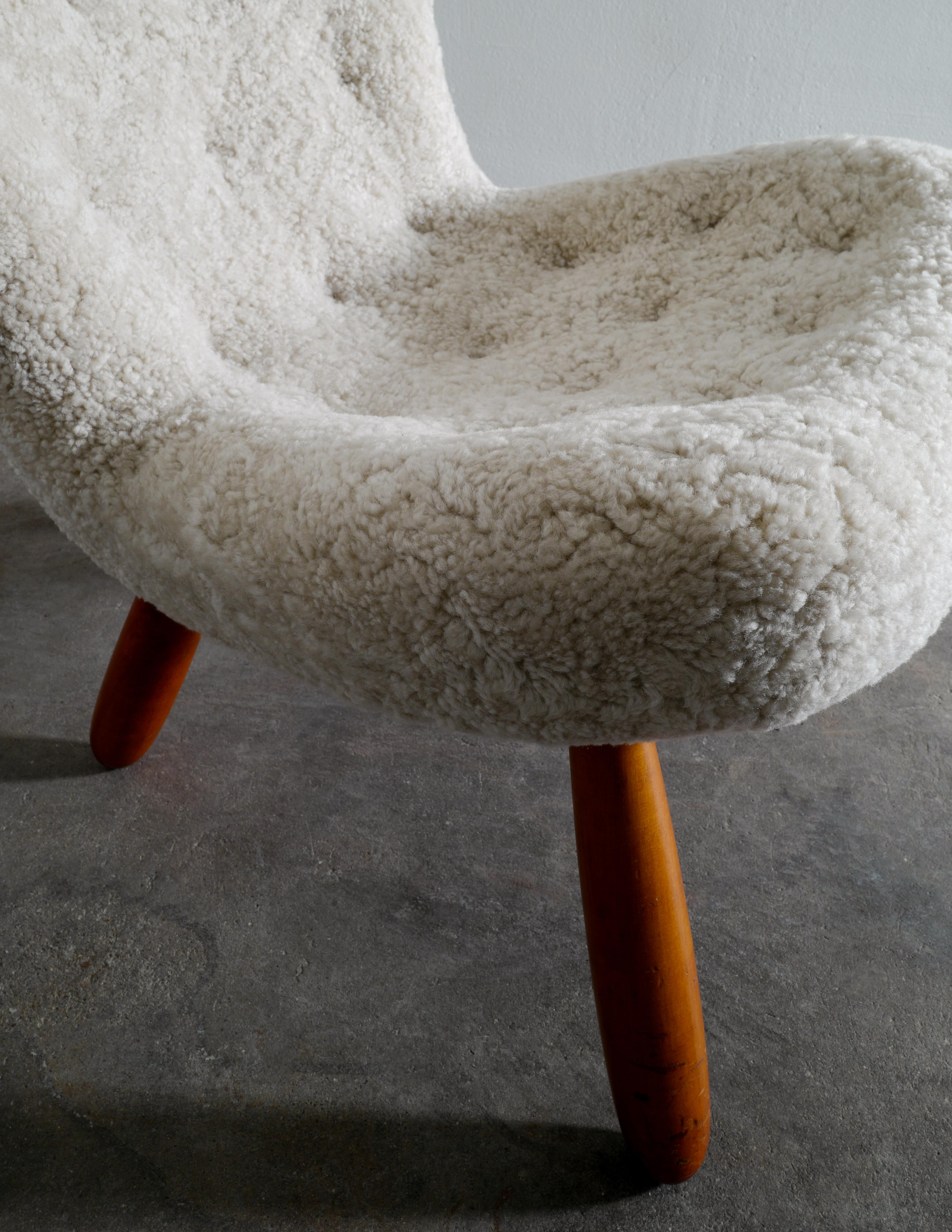 Mid-20th Century Arnold Madsen / Philip Arctander Clam Chair in Sheepskin Prod in Denmark, 1940s