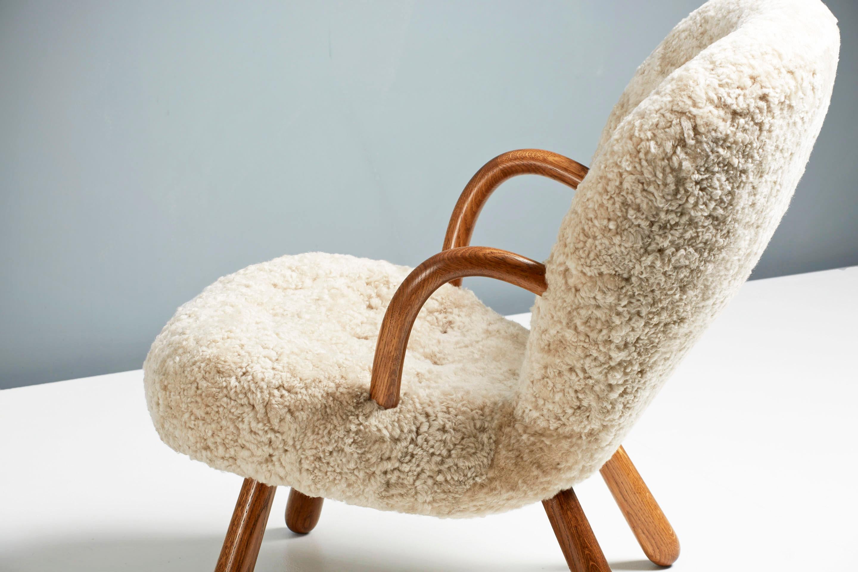 British Re-Edition Sheepskin Clam Chair by Arnold Madsen For Sale