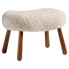 Tabouret Clam Arnold Madsen en peau de mouton