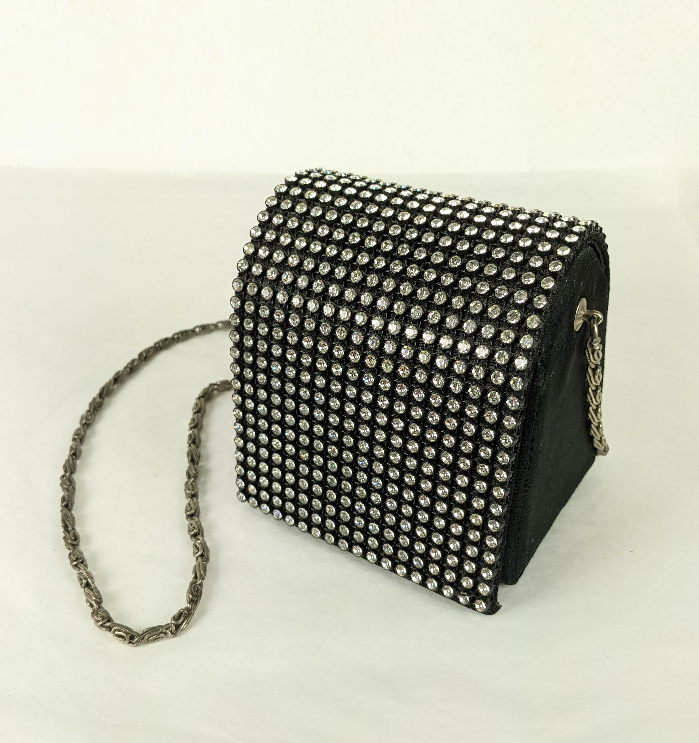 Charming Arnold Scassi Pave Box Bag with shoulder chain in black satin with pave rhinestone flap. Cute box shape with sparkling accents. Faille lining. 1960's USA. 
3.5