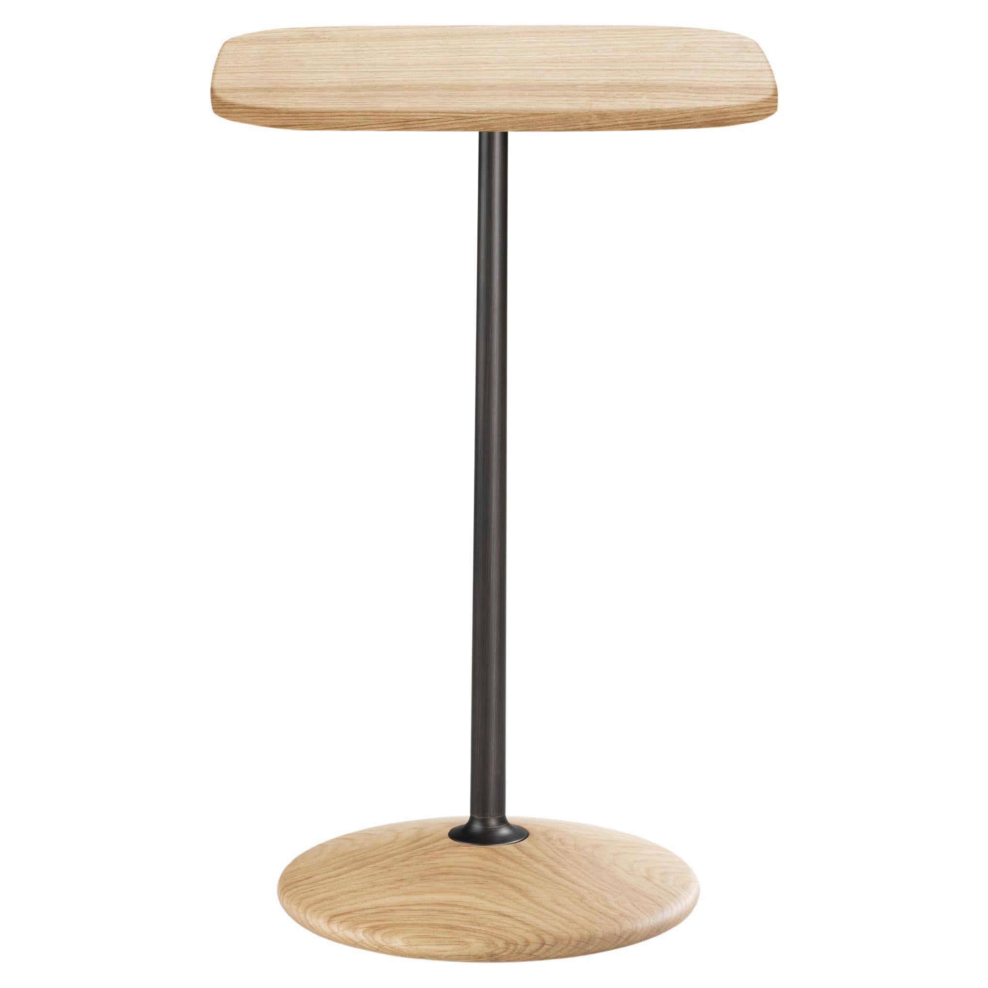 Table haute Arnold, plateau en bois, structure en laiton bruni, fabriquée en Italie