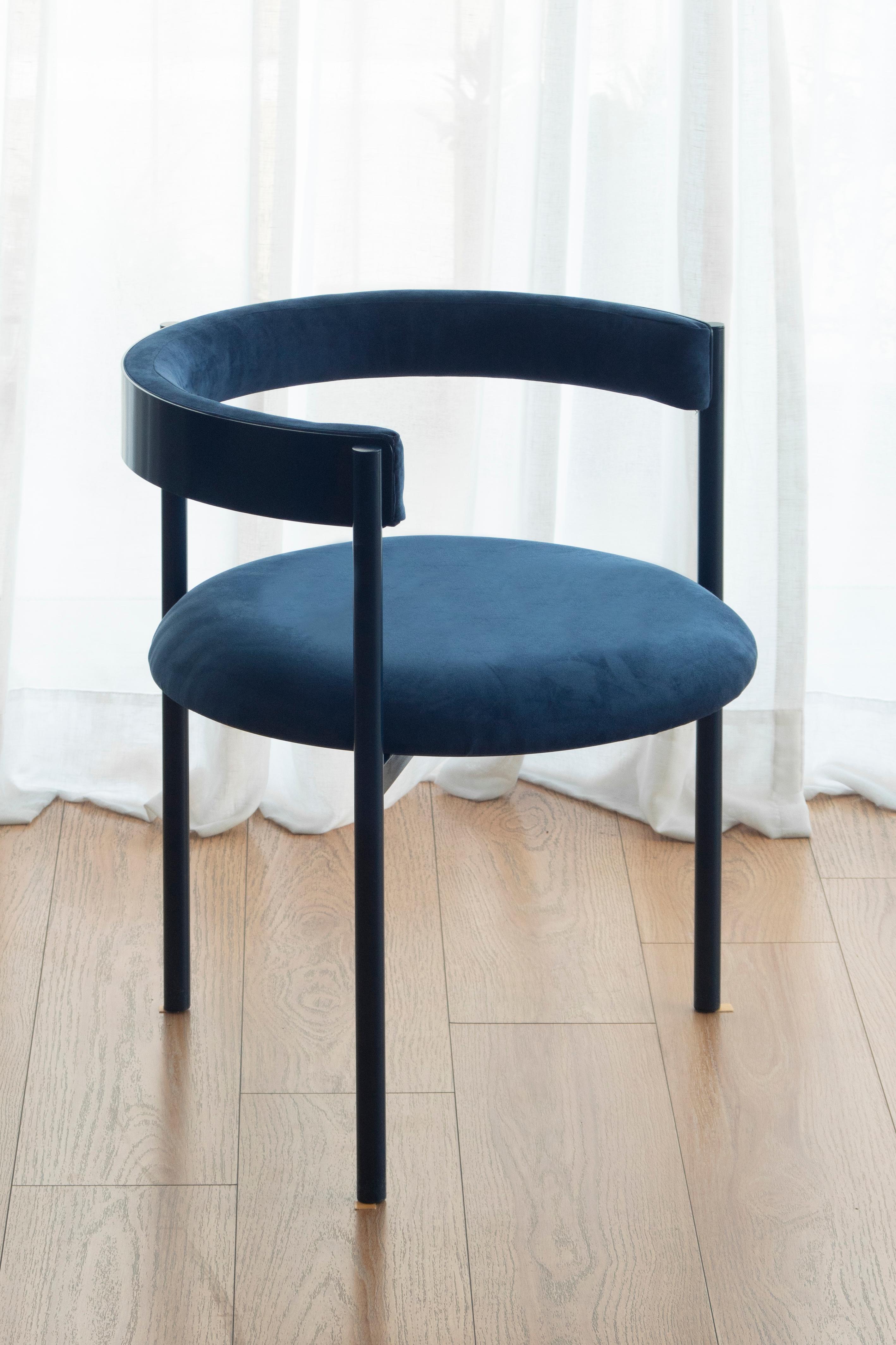 Aro chair, dark blue by Ries
Dimensions: W 60 x D 60 x H 67,5 cm 
Materials: Round steel tube, high-density foam, and velvet upholstery

Also available: Merlot, black, mika, oceano, pink and yellow.

Ries is a design studio based in Buenos