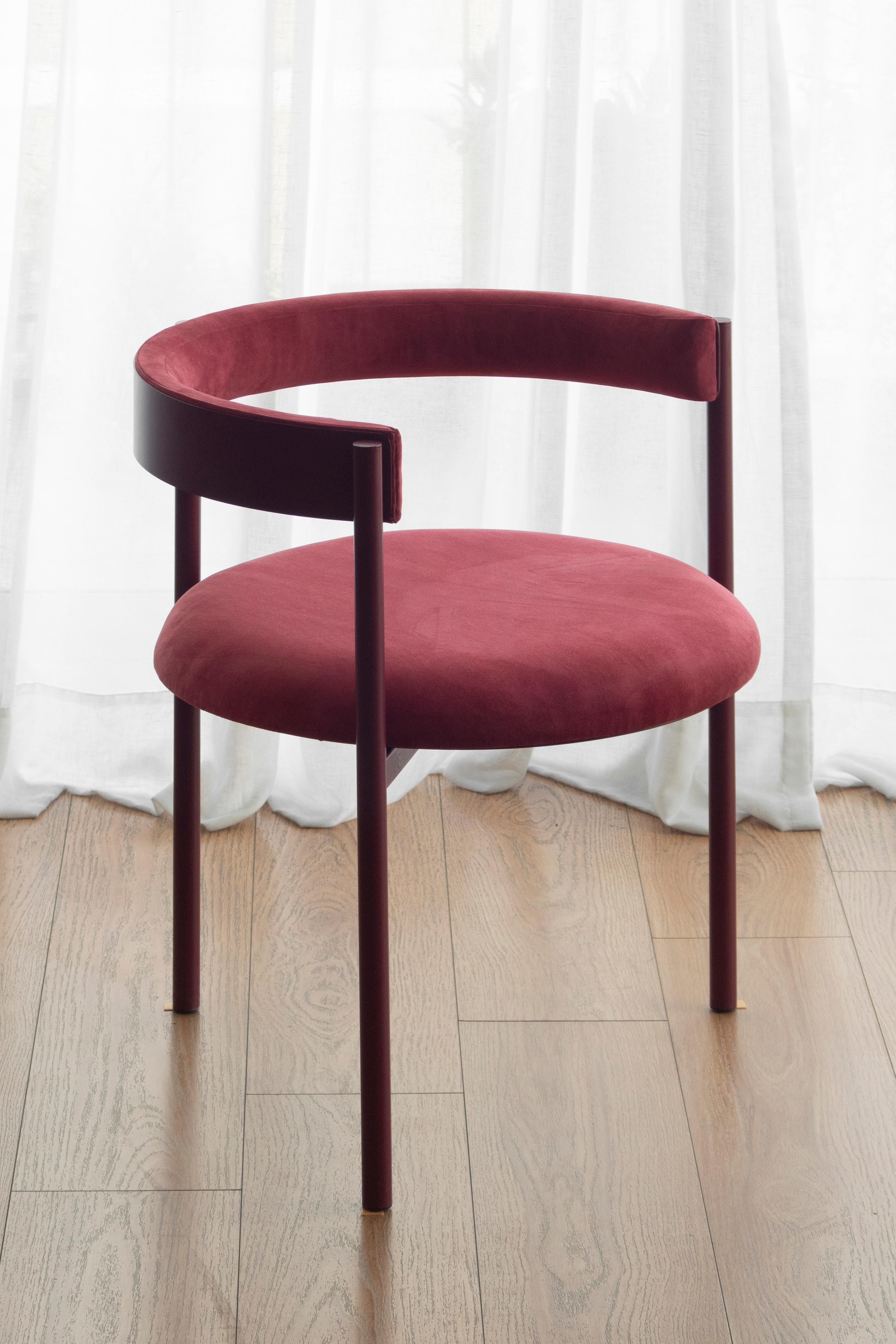 Aro Chair, Merlot by Ries
Dimensions: W60 x D60 x H67,5 cm 
Materials: round steel tube, high-density foam, and velvet upholstery

Also available: black, dark blue, mika, oceano, pink and yellow,

Ries is a design studio based in Buenos Aires,