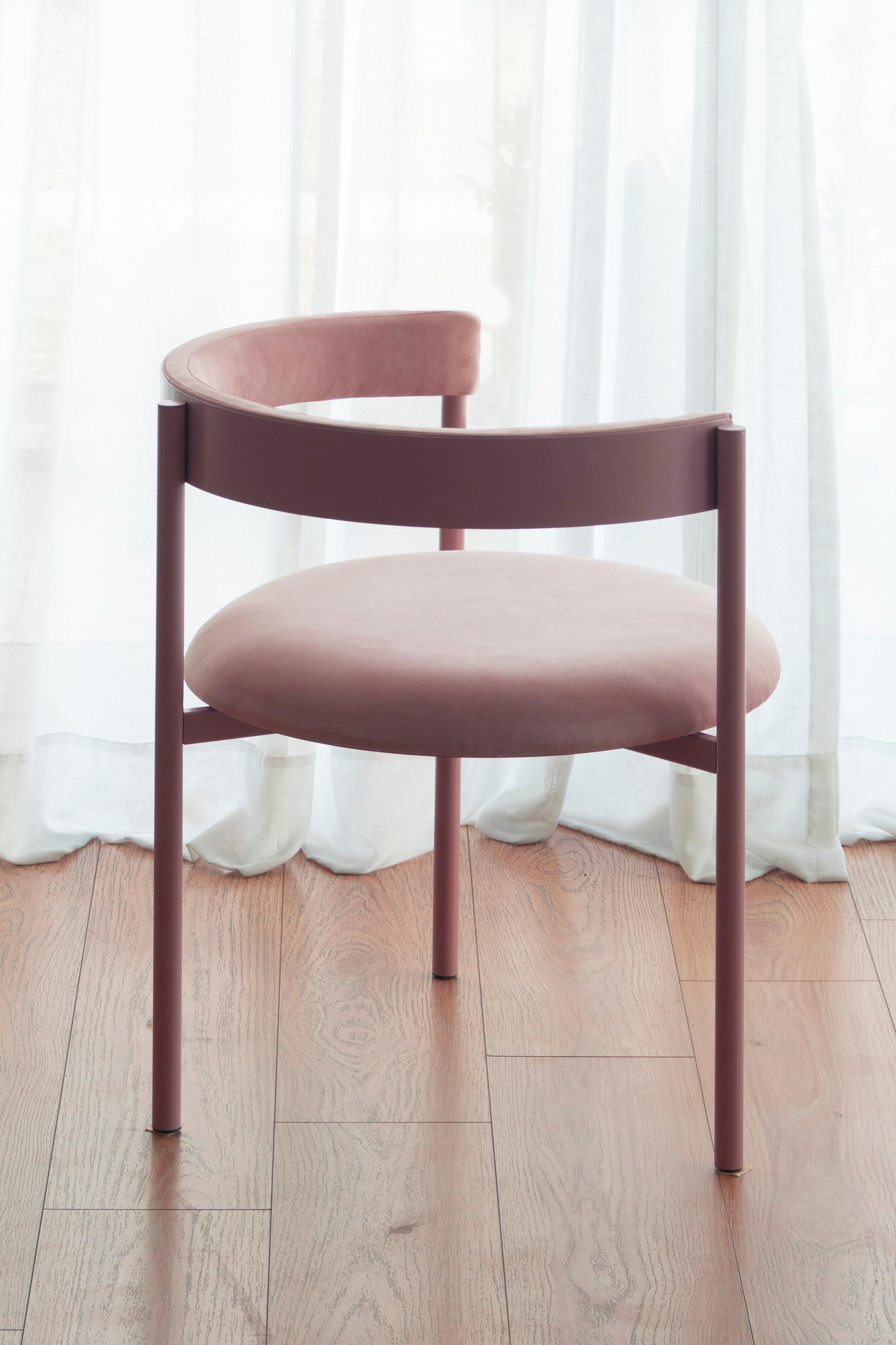 Aro chair, Pink by Ries
Dimensions: W60 x D60 x H67,5 cm 
Materials: Round Steel Tube, High-Density Foam, and Velvet Upholstery

Also Available: Merlot, Black, Yellow, Mika, Oceano, and Dark Blue.

Ries is a design studio based in Buenos
